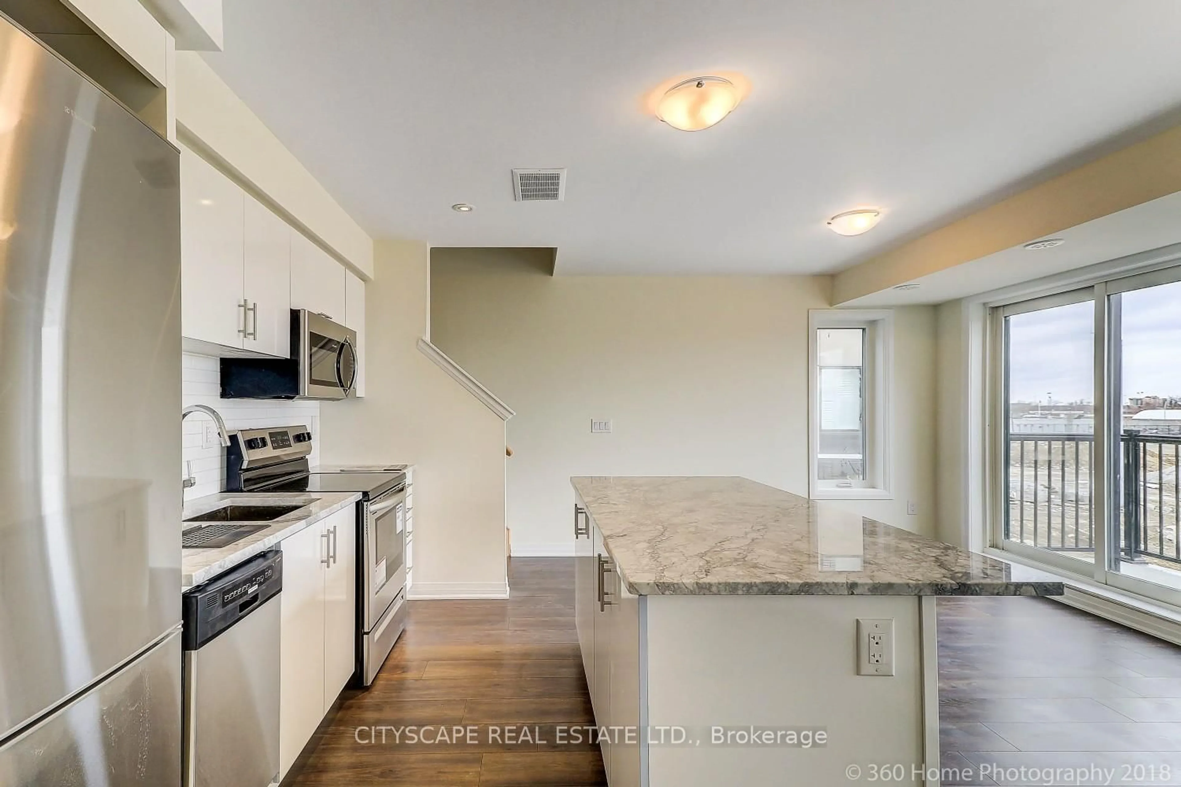 Open concept kitchen, ceramic/tile floor for 142 William Duncan Rd #4, Toronto Ontario M3K 0C1