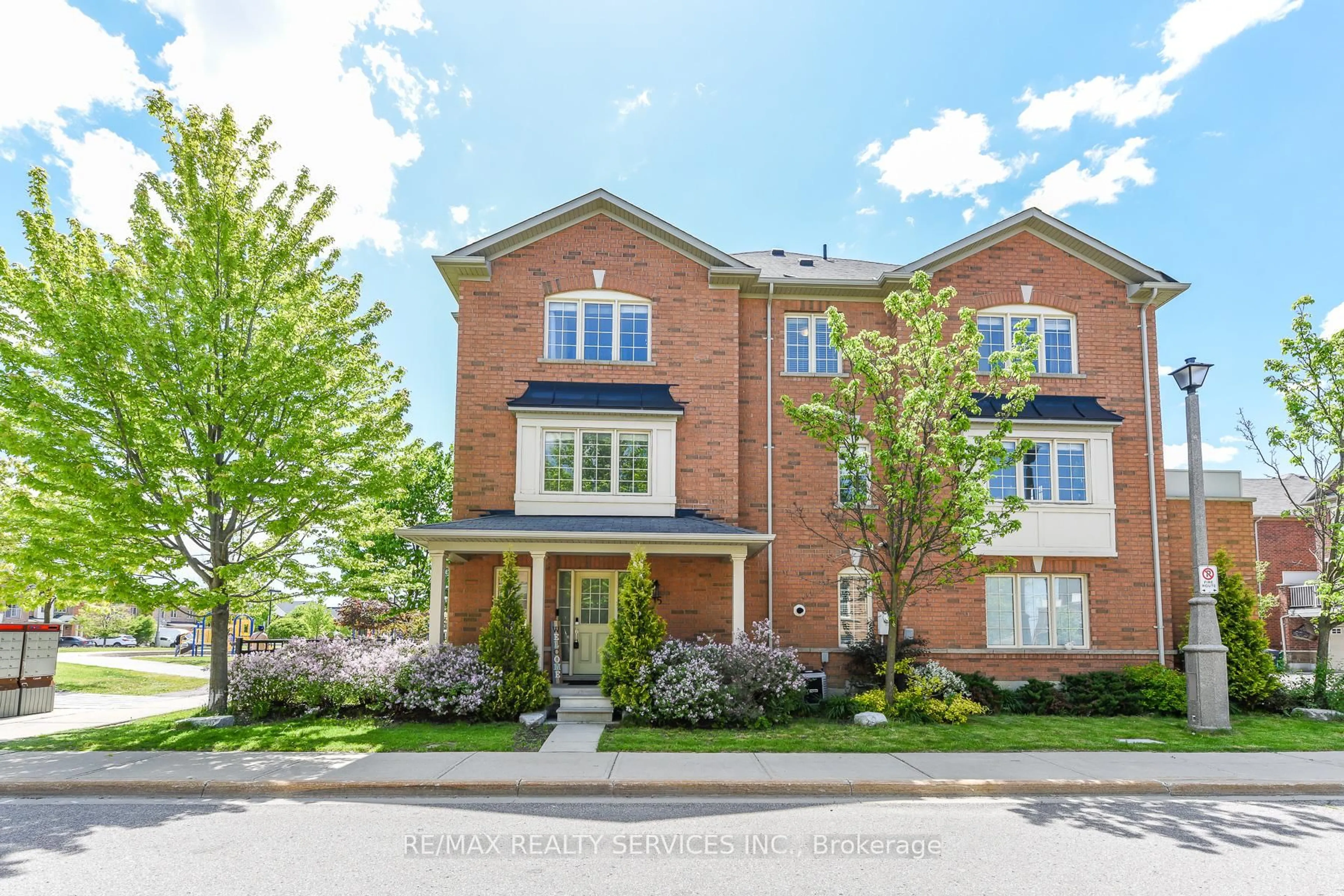 Home with brick exterior material, street for 15 Peach Dr, Brampton Ontario L6R 0W5