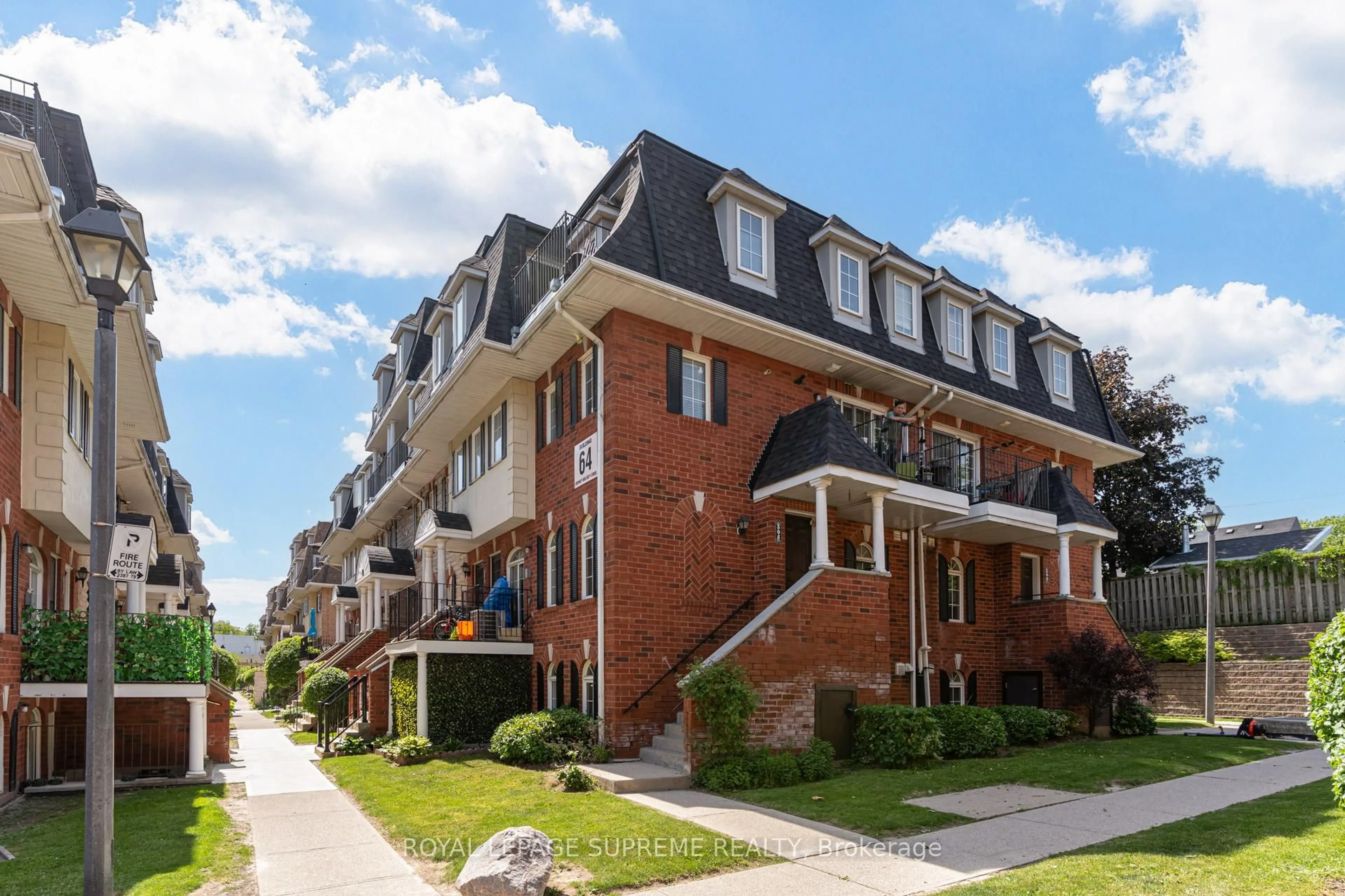 Home with brick exterior material, street for 64 Sidney Belsey Cres #307, Toronto Ontario M6M 5J4