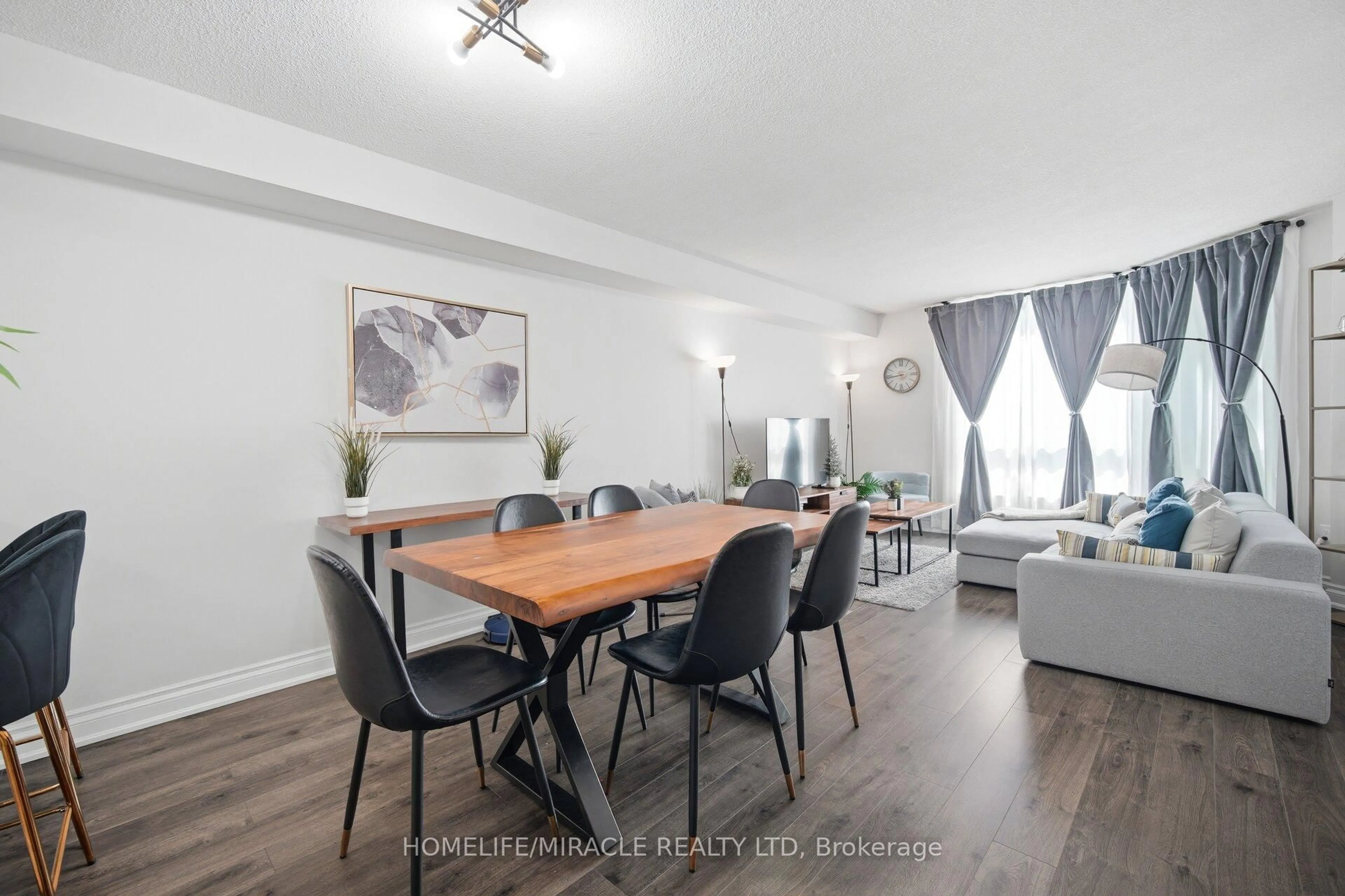 Dining room, wood/laminate floor for 238 Albion Rd #102, Toronto Ontario M9W 6A7