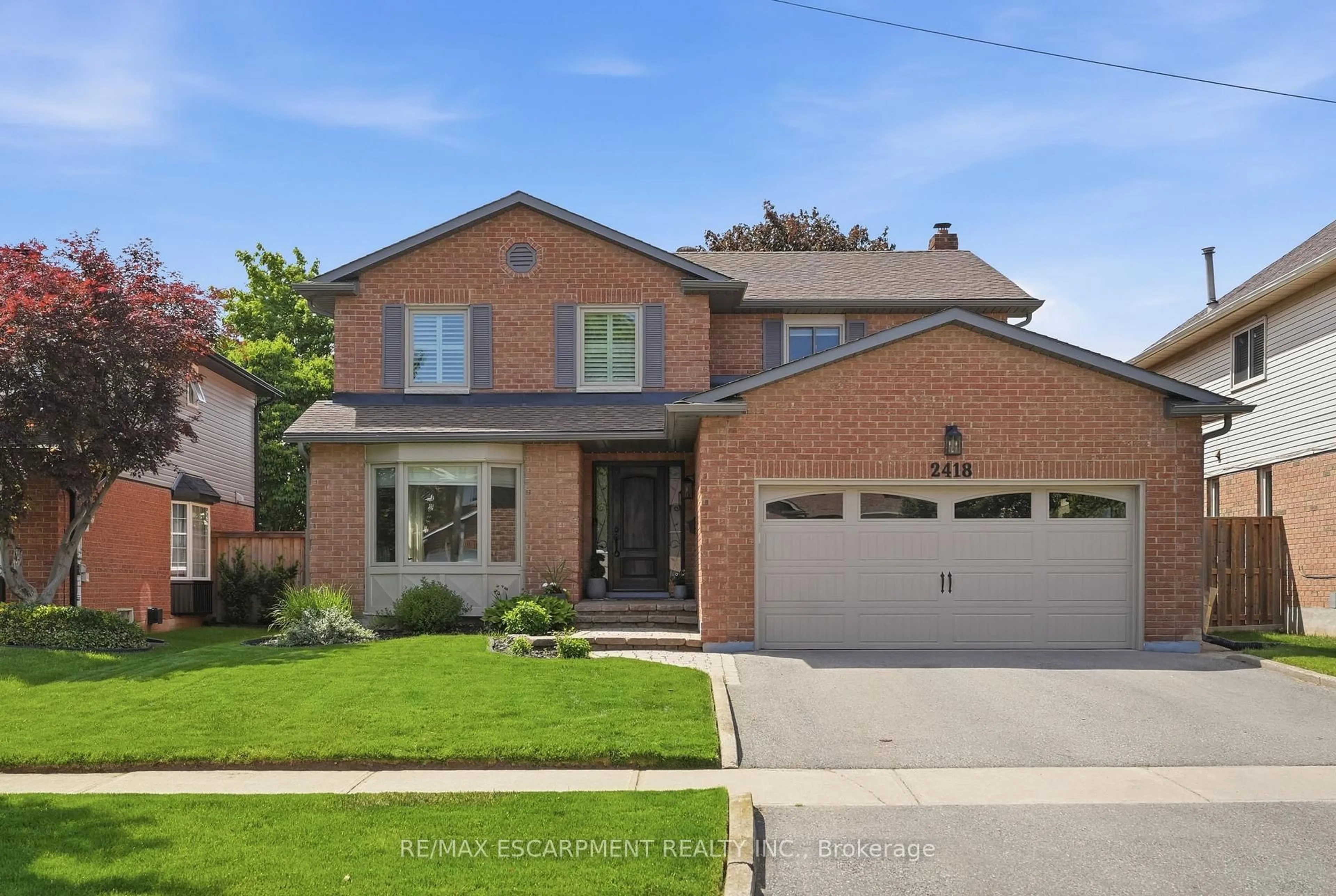 Home with brick exterior material, street for 2418 BUTTERNUT Cres, Burlington Ontario L7M 3L3