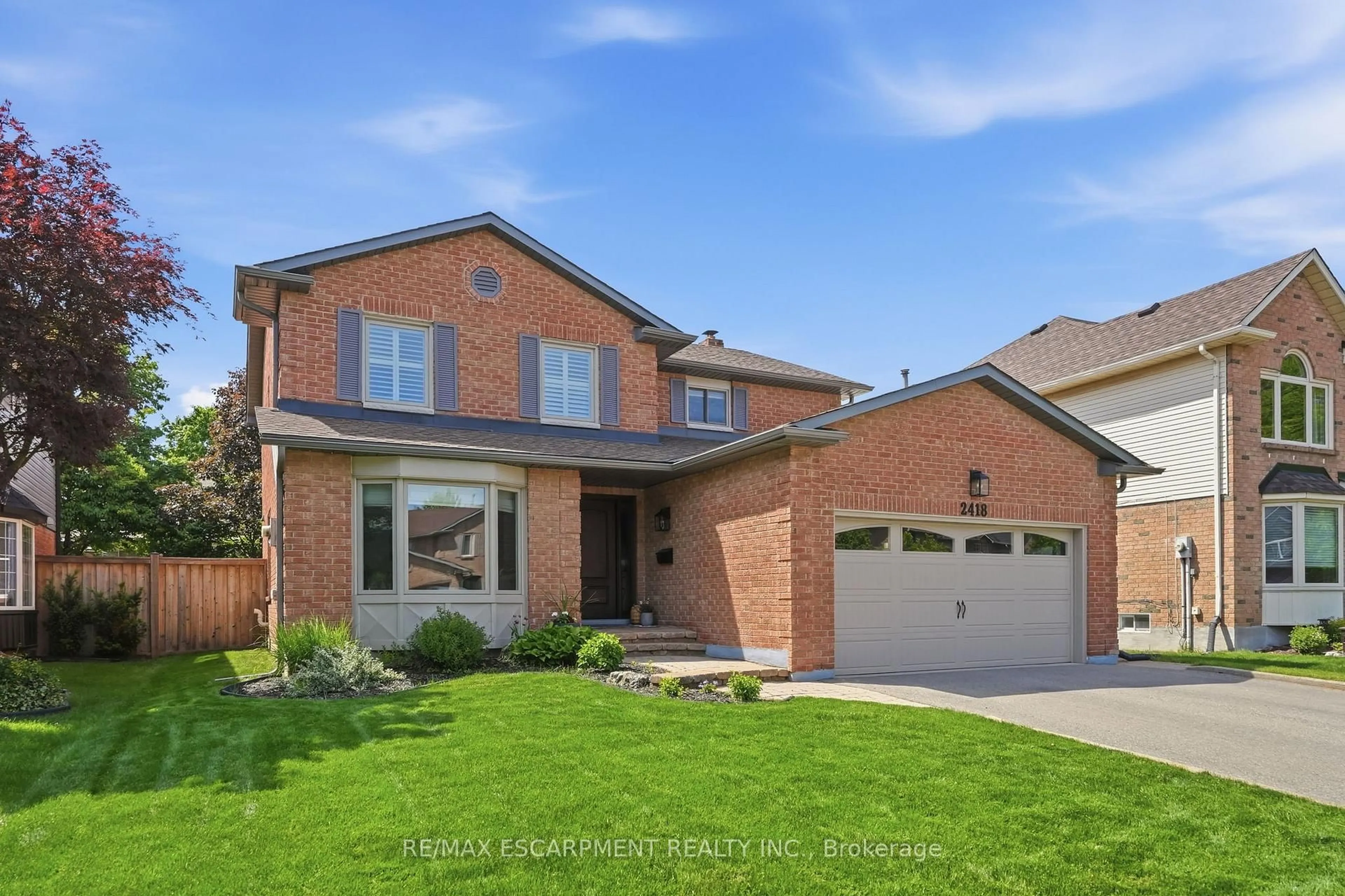 Home with brick exterior material, street for 2418 BUTTERNUT Cres, Burlington Ontario L7M 3L3