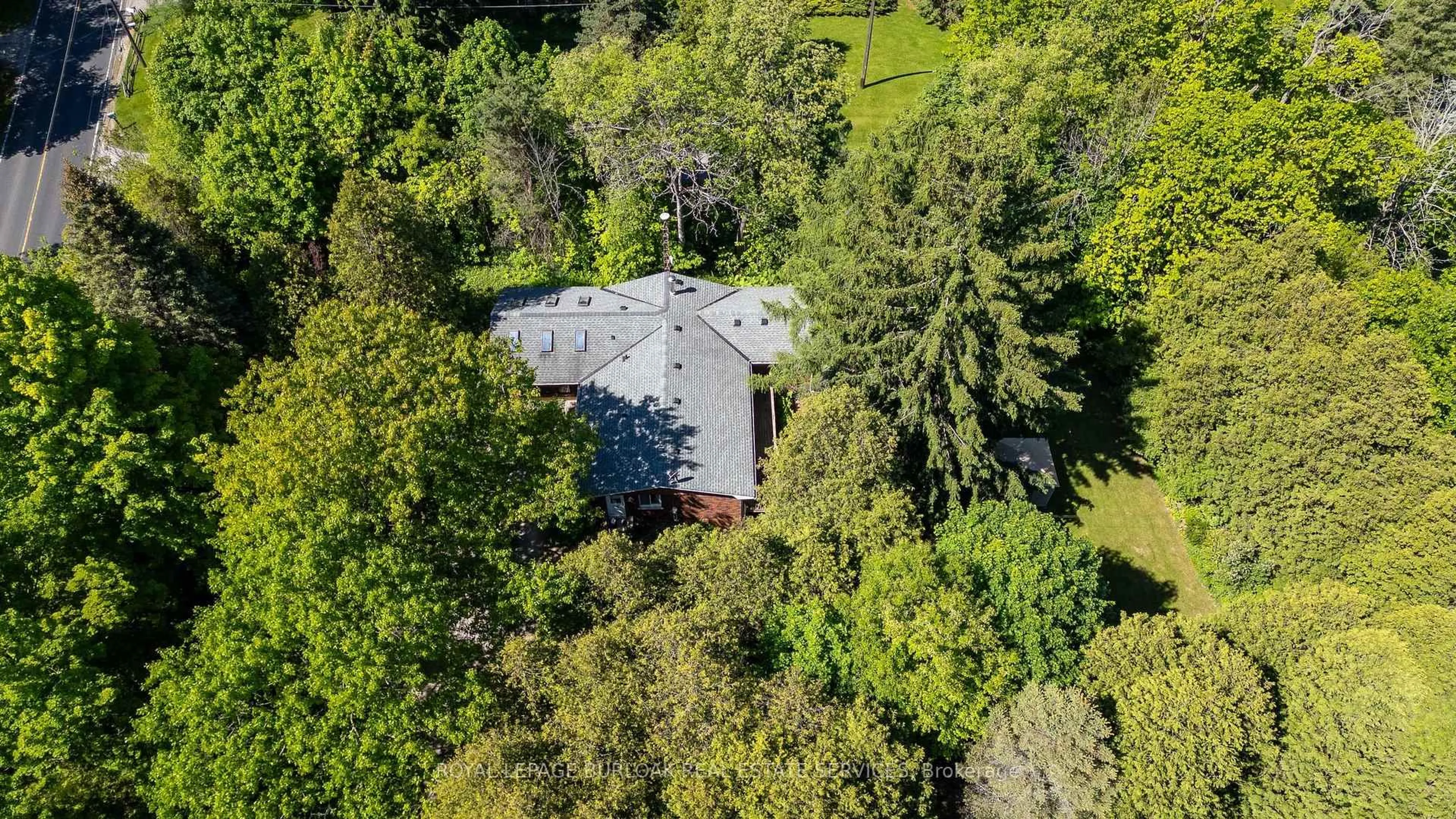 A pic from outside/outdoor area/front of a property/back of a property/a pic from drone, forest/trees view for 1265 Britannia Rd, Burlington Ontario L7P 0E7