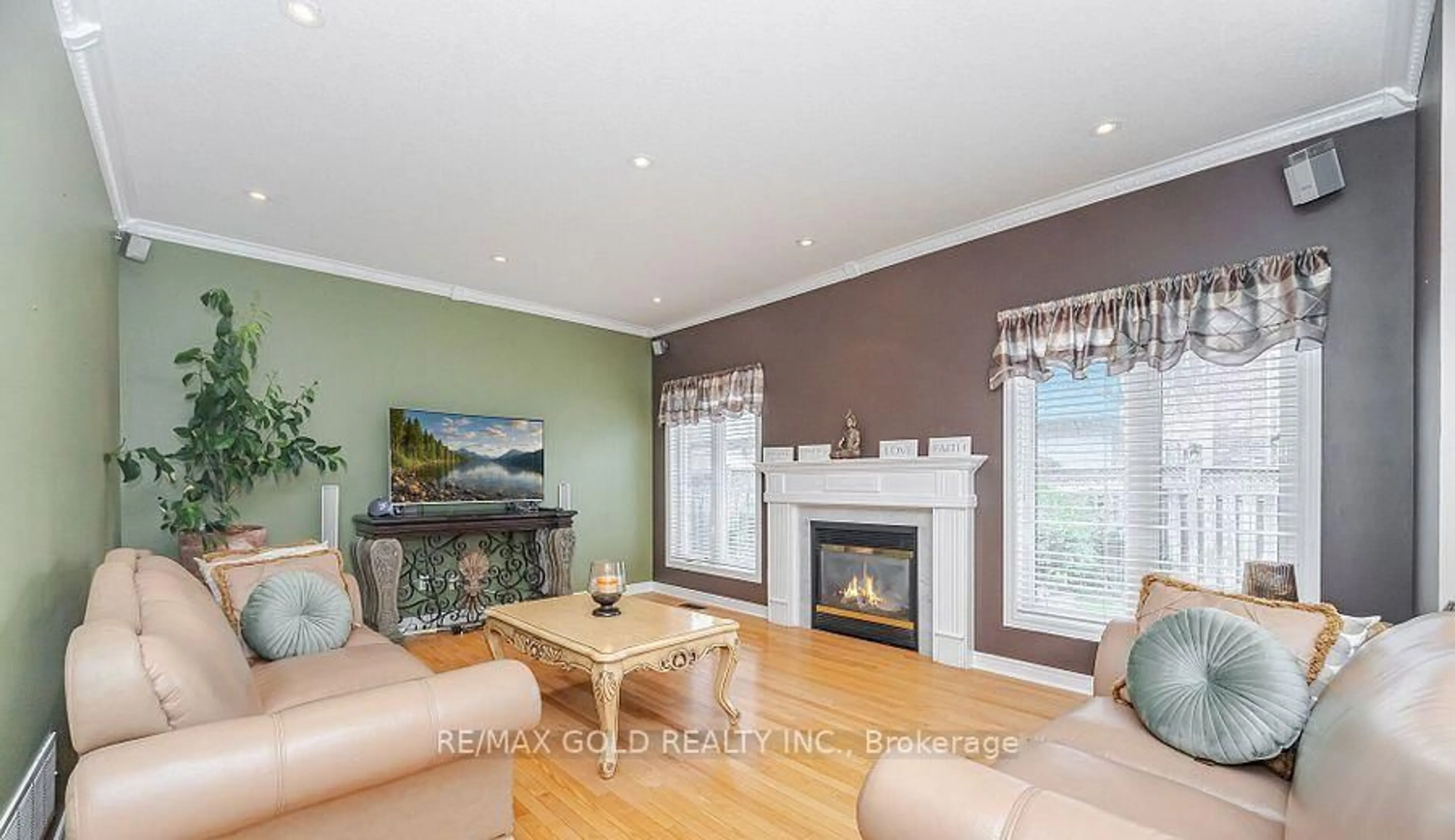 Living room with furniture, wood/laminate floor for 5 Summershade St, Brampton Ontario L6P 2B9