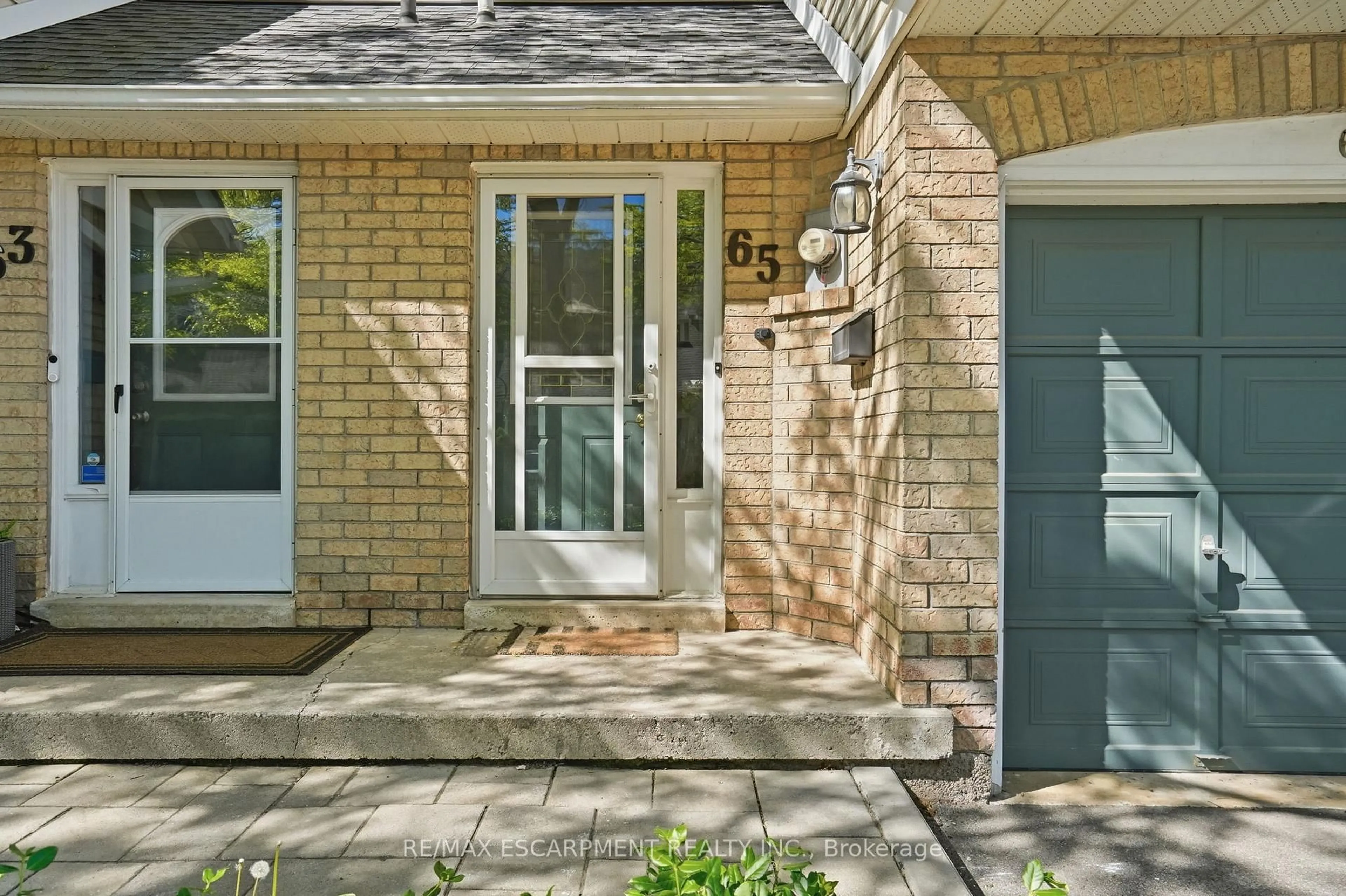 Home with brick exterior material, street for 2530 Northampton Blvd #65, Burlington Ontario L7M 4B4