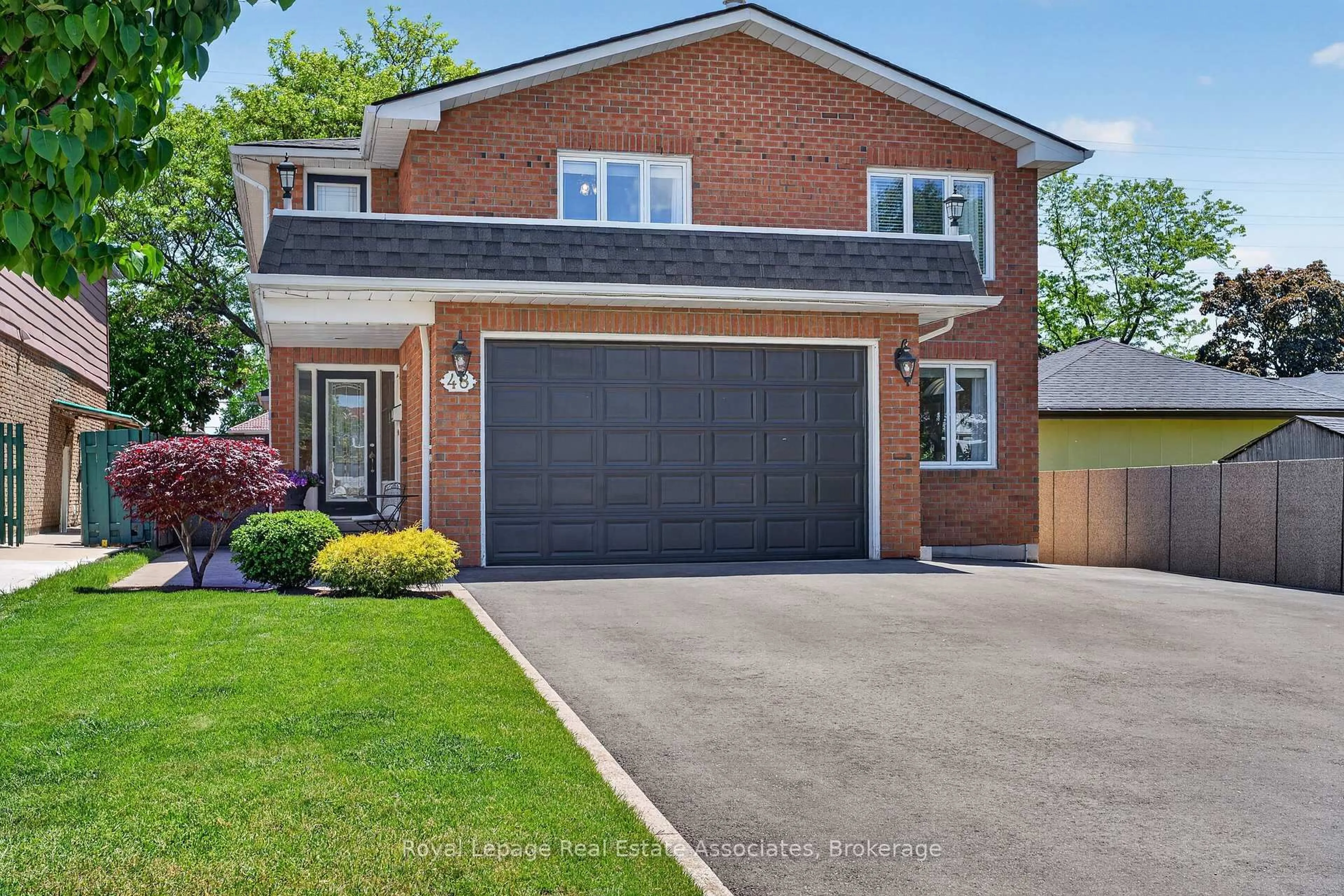Home with brick exterior material, street for 48 Hudson Dr, Brampton Ontario L6Y 2N7