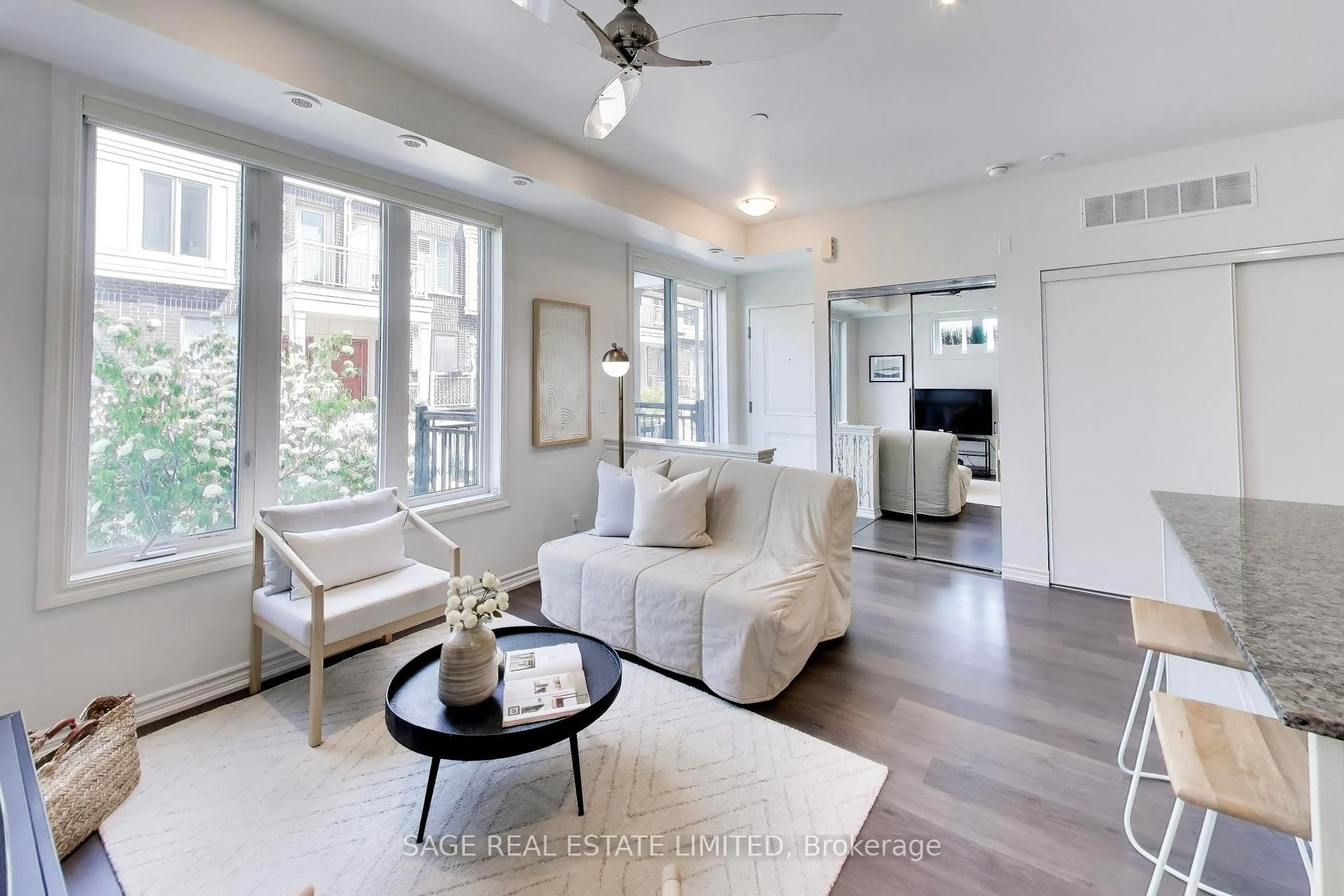 Living room with furniture, unknown for 130 Long Branch Ave #2, Toronto Ontario M8W 0B2