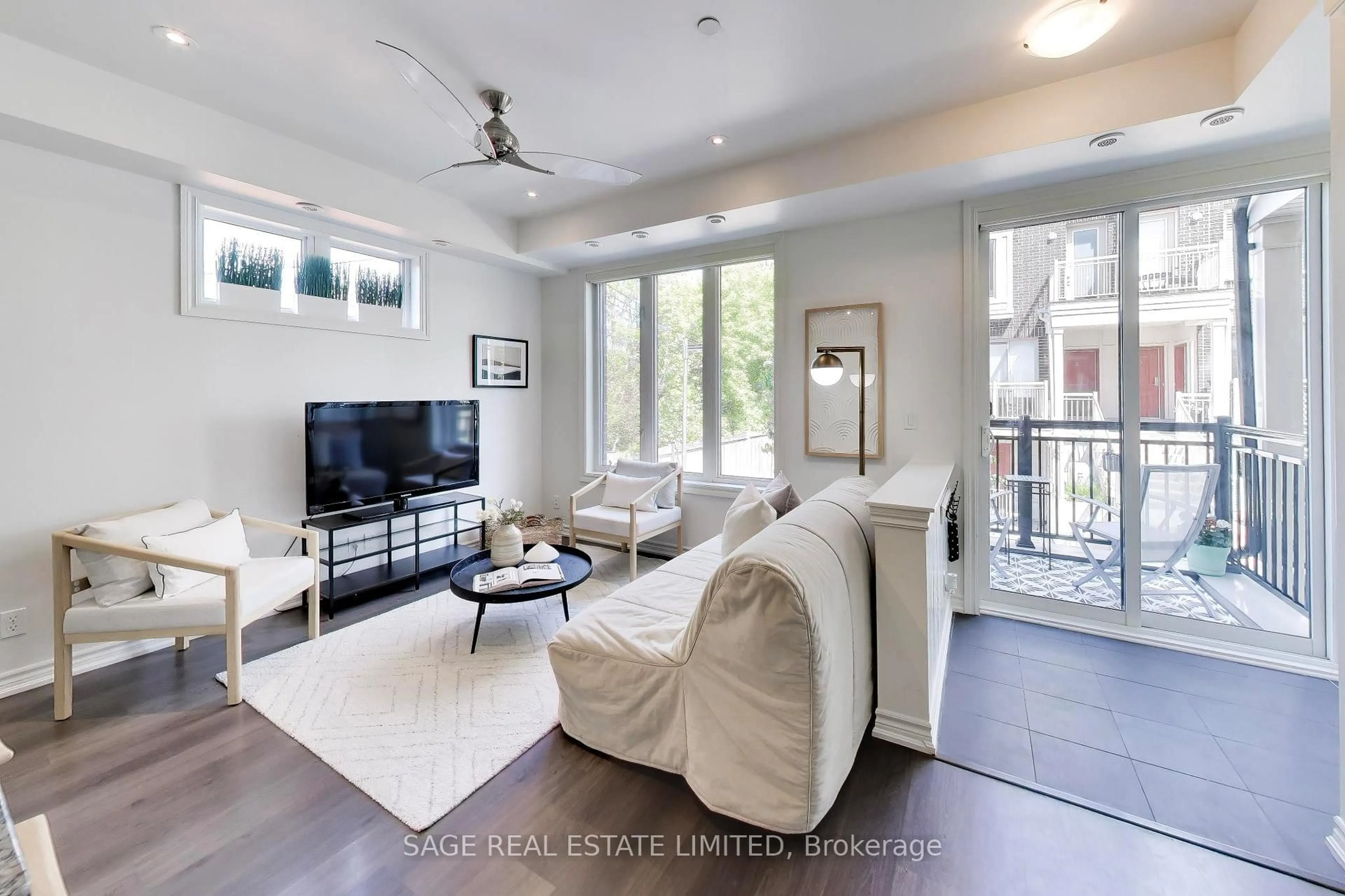 Living room with furniture, unknown for 130 Long Branch Ave #2, Toronto Ontario M8W 0B2
