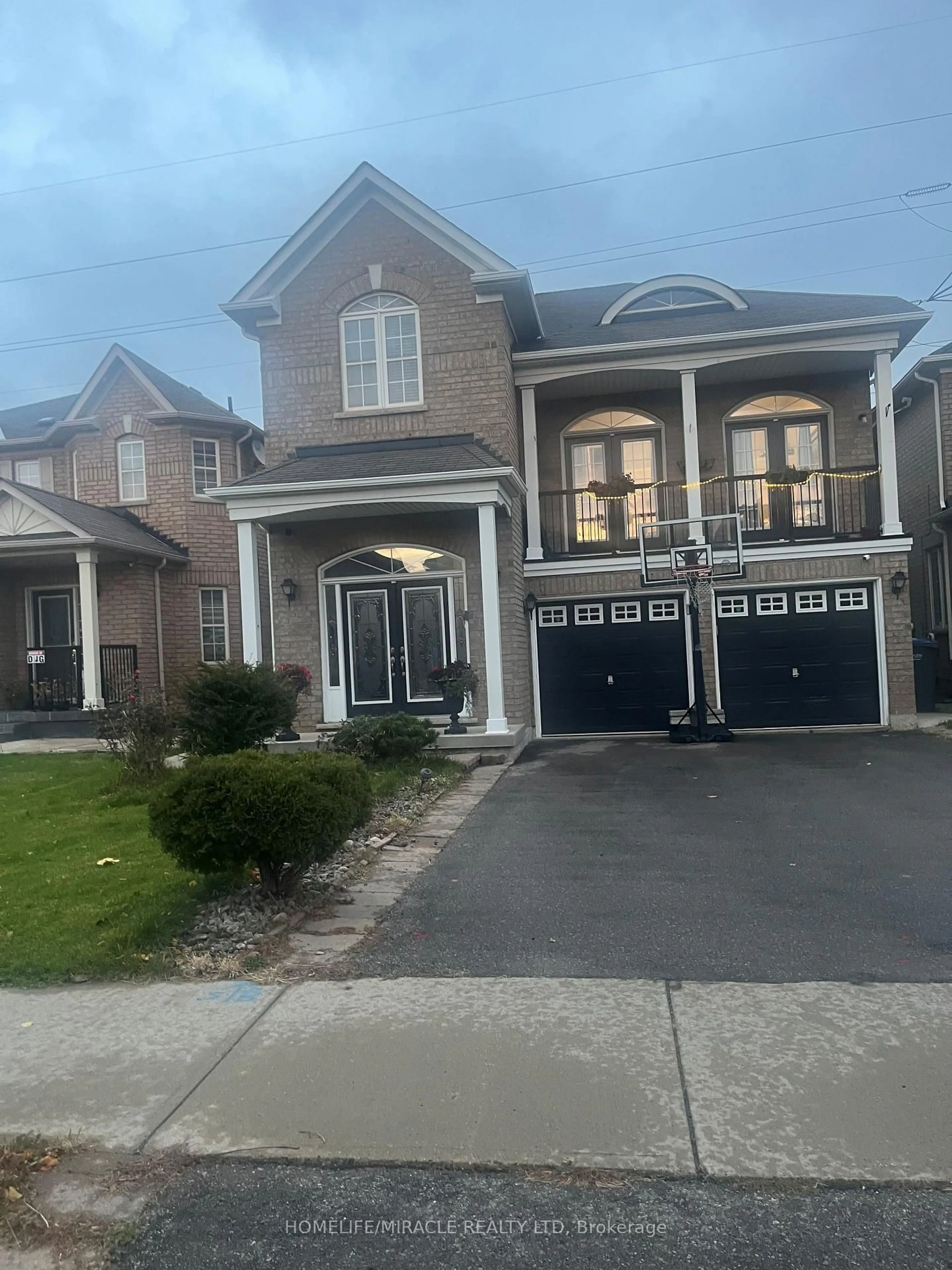 Home with brick exterior material, street for 23 Roundstone Dr, Brampton Ontario L6X 0K7