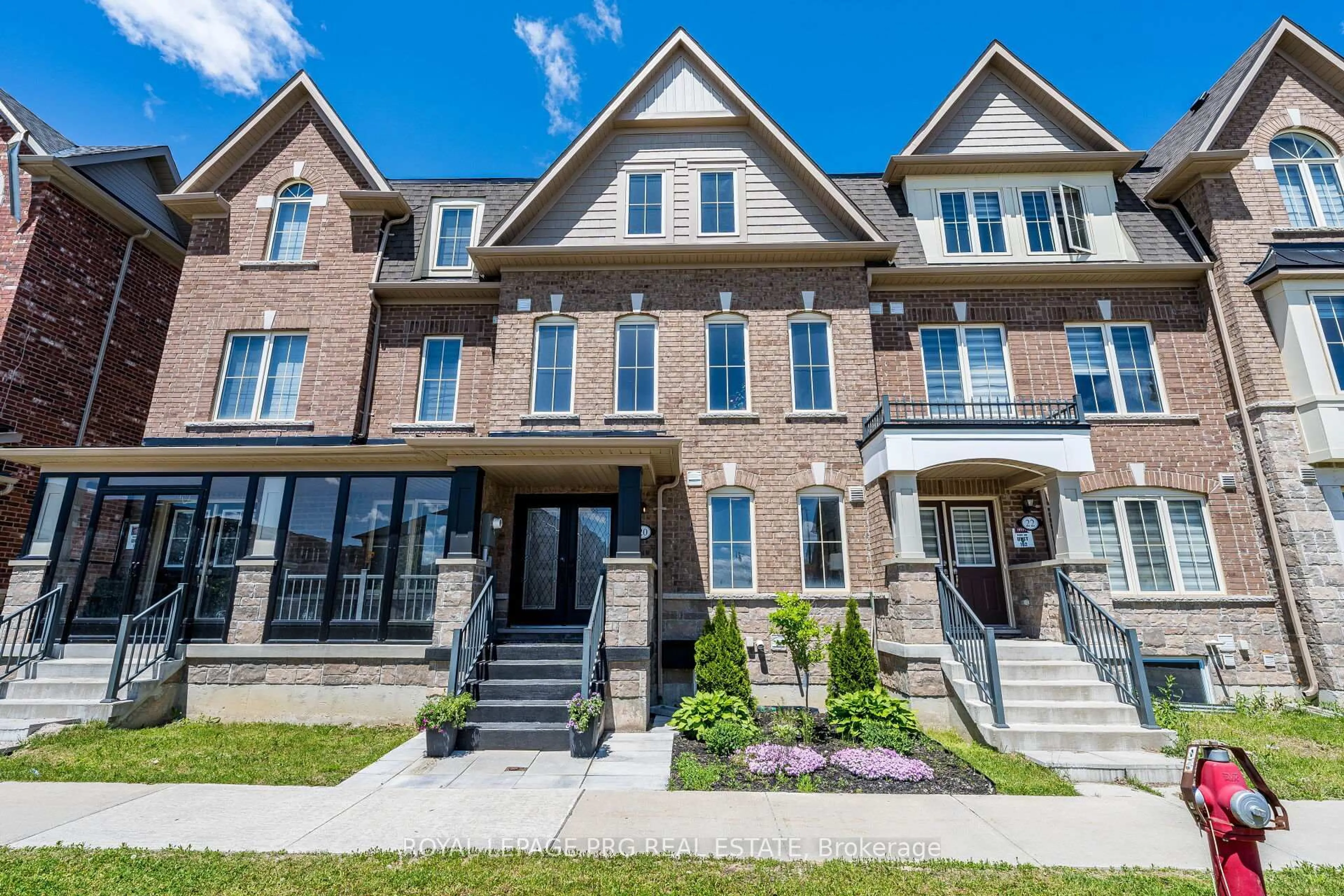 Home with brick exterior material, street for 20 Remembrance Rd, Brampton Ontario L7A 4Y8