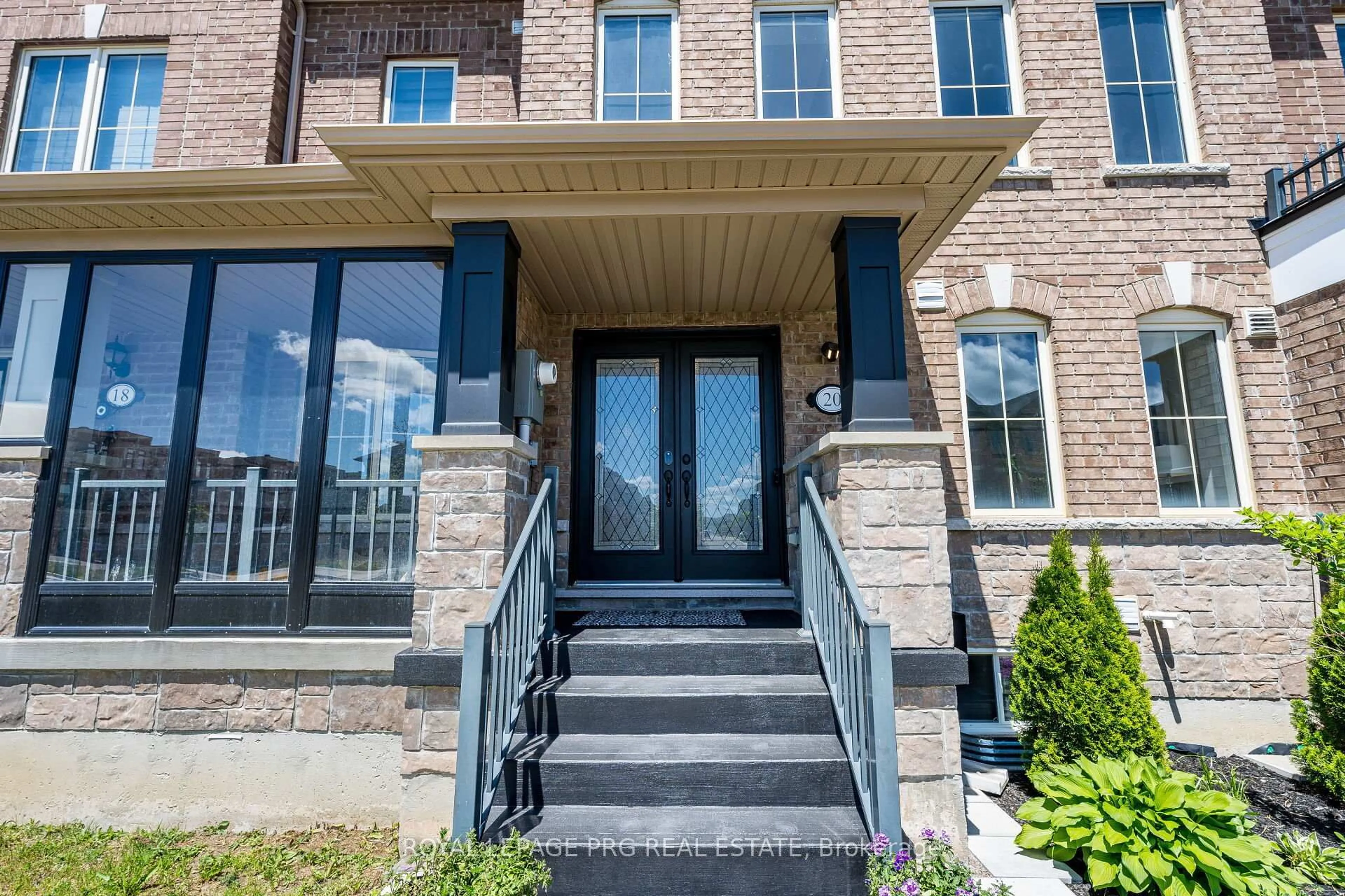 Home with brick exterior material, street for 20 Remembrance Rd, Brampton Ontario L7A 4Y8