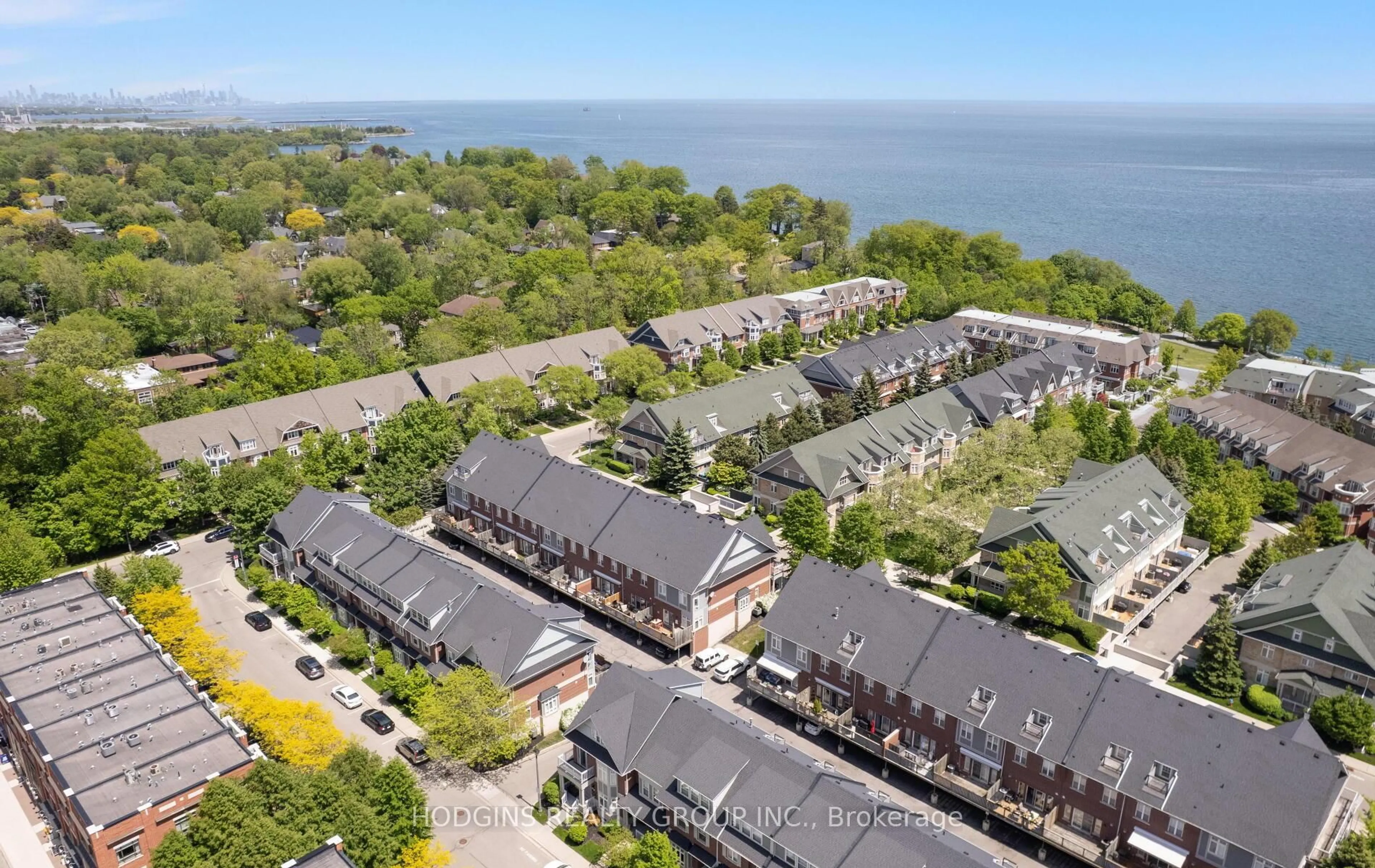 A pic from outside/outdoor area/front of a property/back of a property/a pic from drone, water/lake/river/ocean view for 136 St Lawrence Dr #42, Mississauga Ontario L5G 4V1