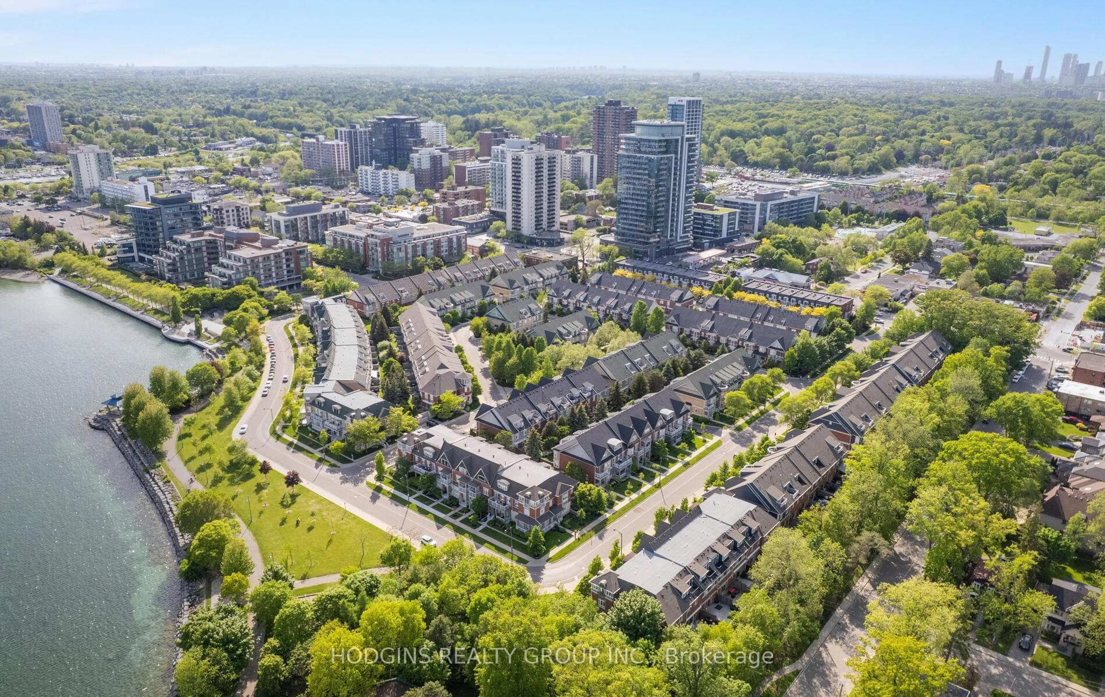A pic from outside/outdoor area/front of a property/back of a property/a pic from drone, city buildings view from balcony for 136 St Lawrence Dr #42, Mississauga Ontario L5G 4V1