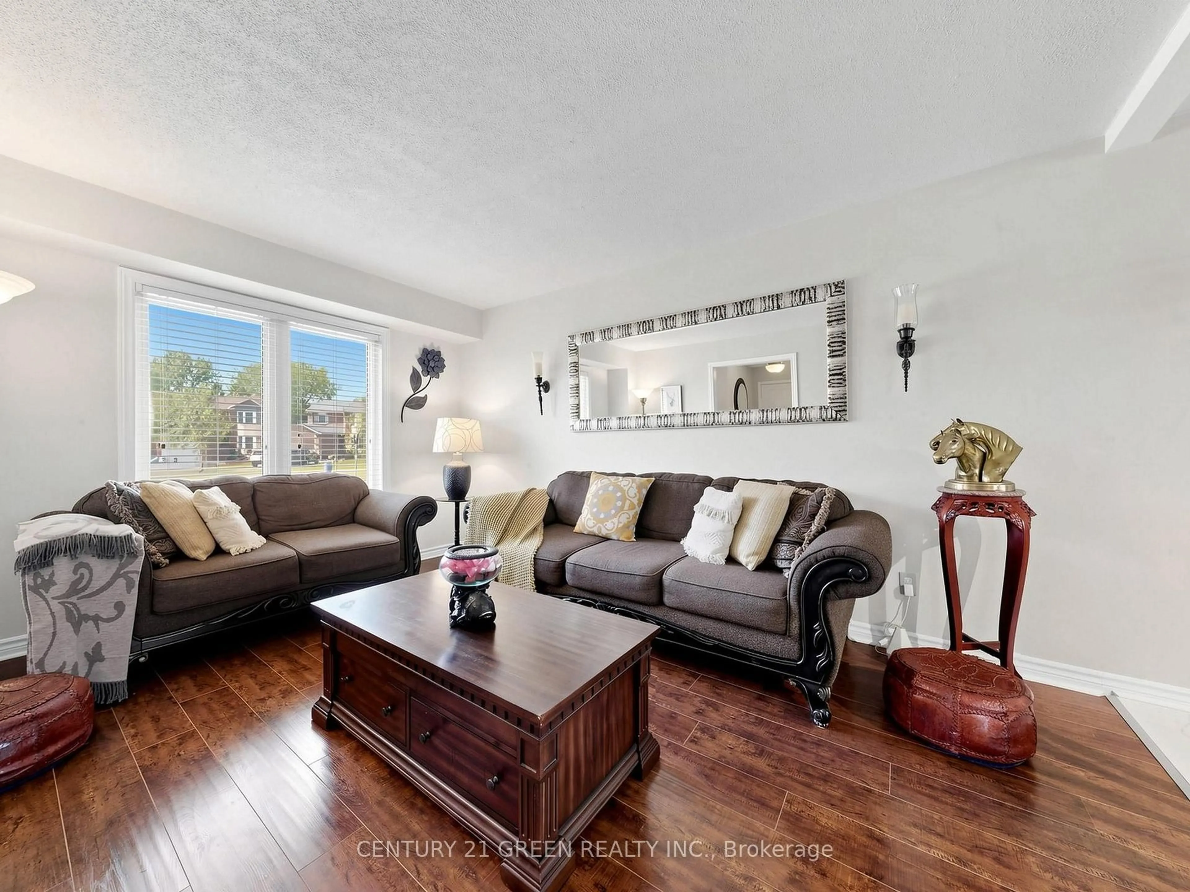 Living room with furniture, wood/laminate floor for 2409 Paula Crt, Burlington Ontario L7P 4M1