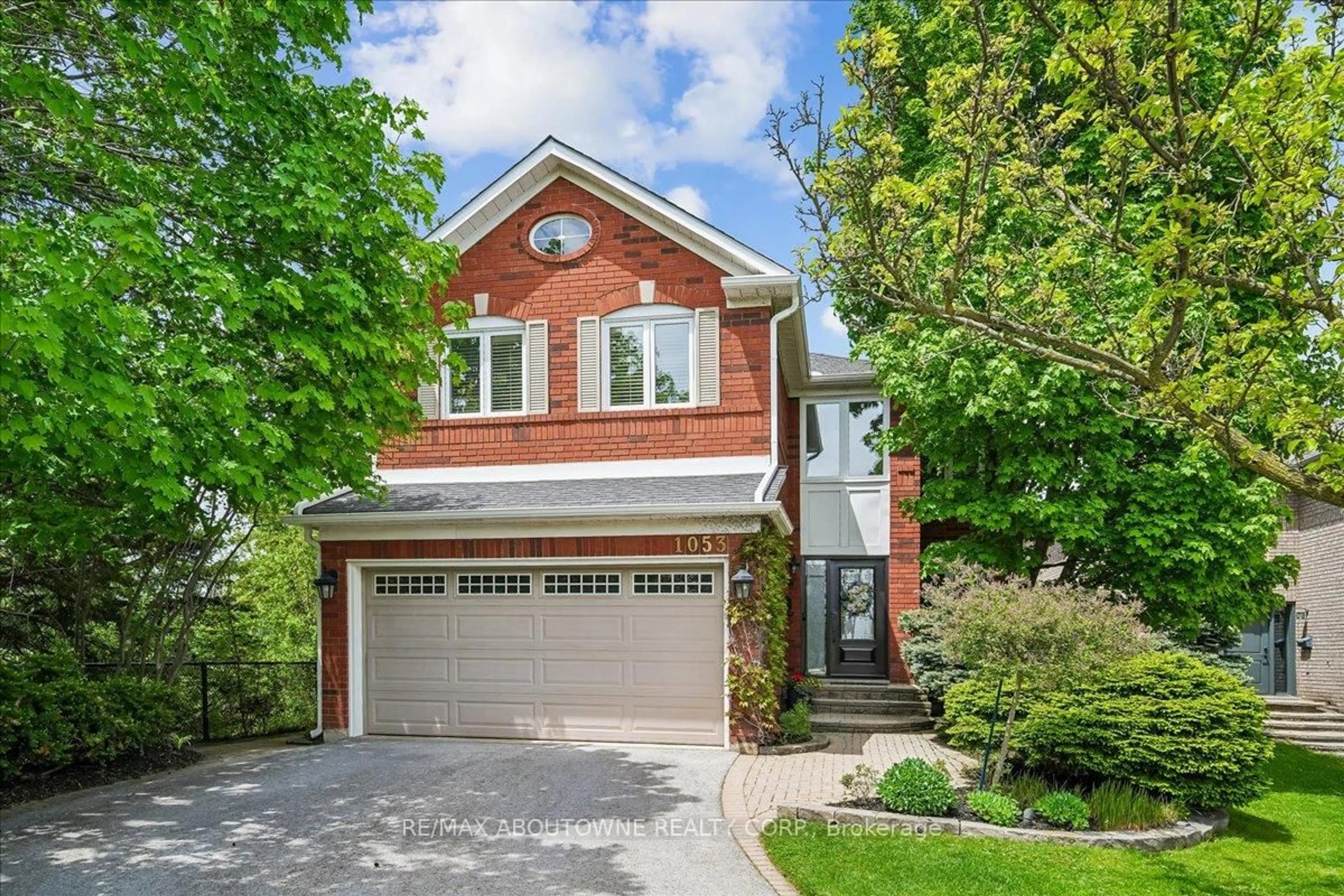 Home with brick exterior material, street for 1053 Old Oak Dr, Oakville Ontario L6M 3K5