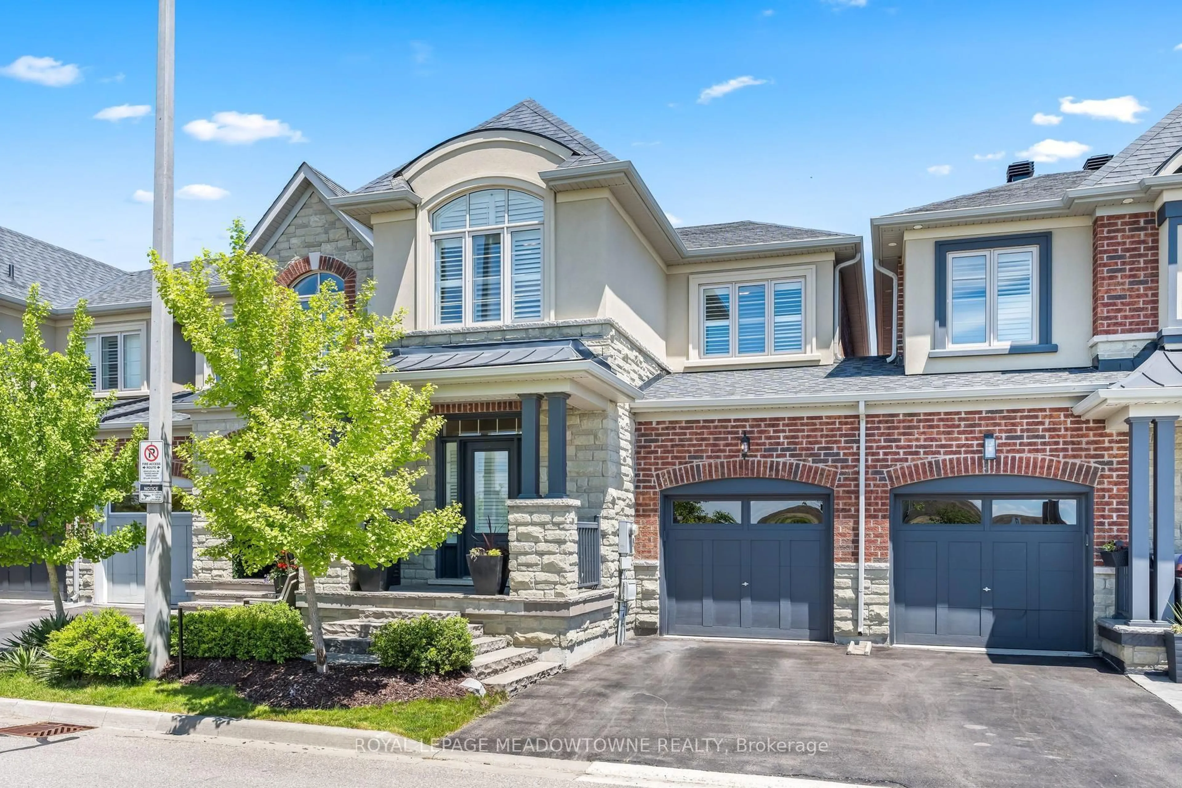 Home with brick exterior material, street for 45 Rain Forest Lane, Halton Hills Ontario L7G 0L8
