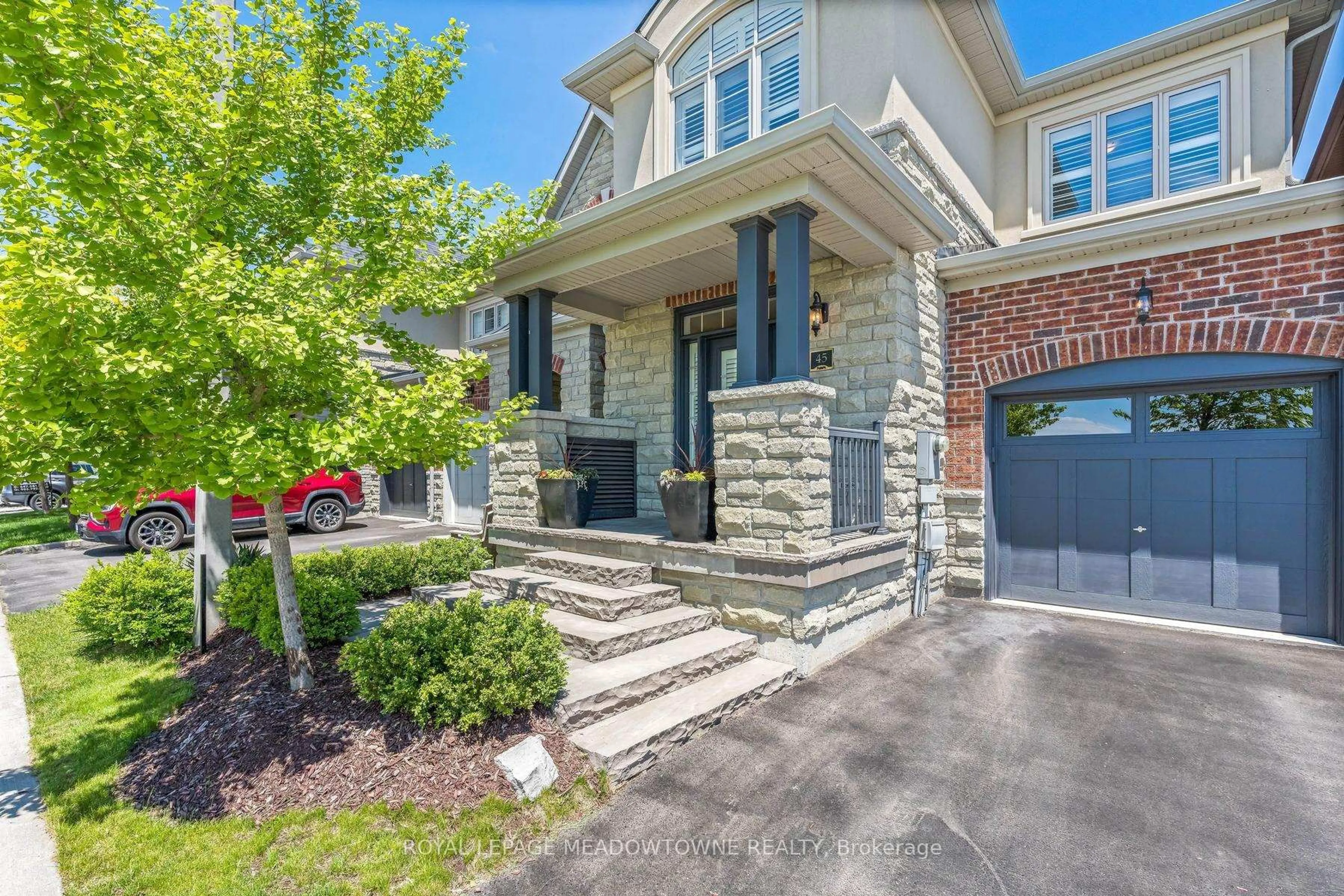 Home with brick exterior material, street for 45 Rain Forest Lane, Halton Hills Ontario L7G 0L8