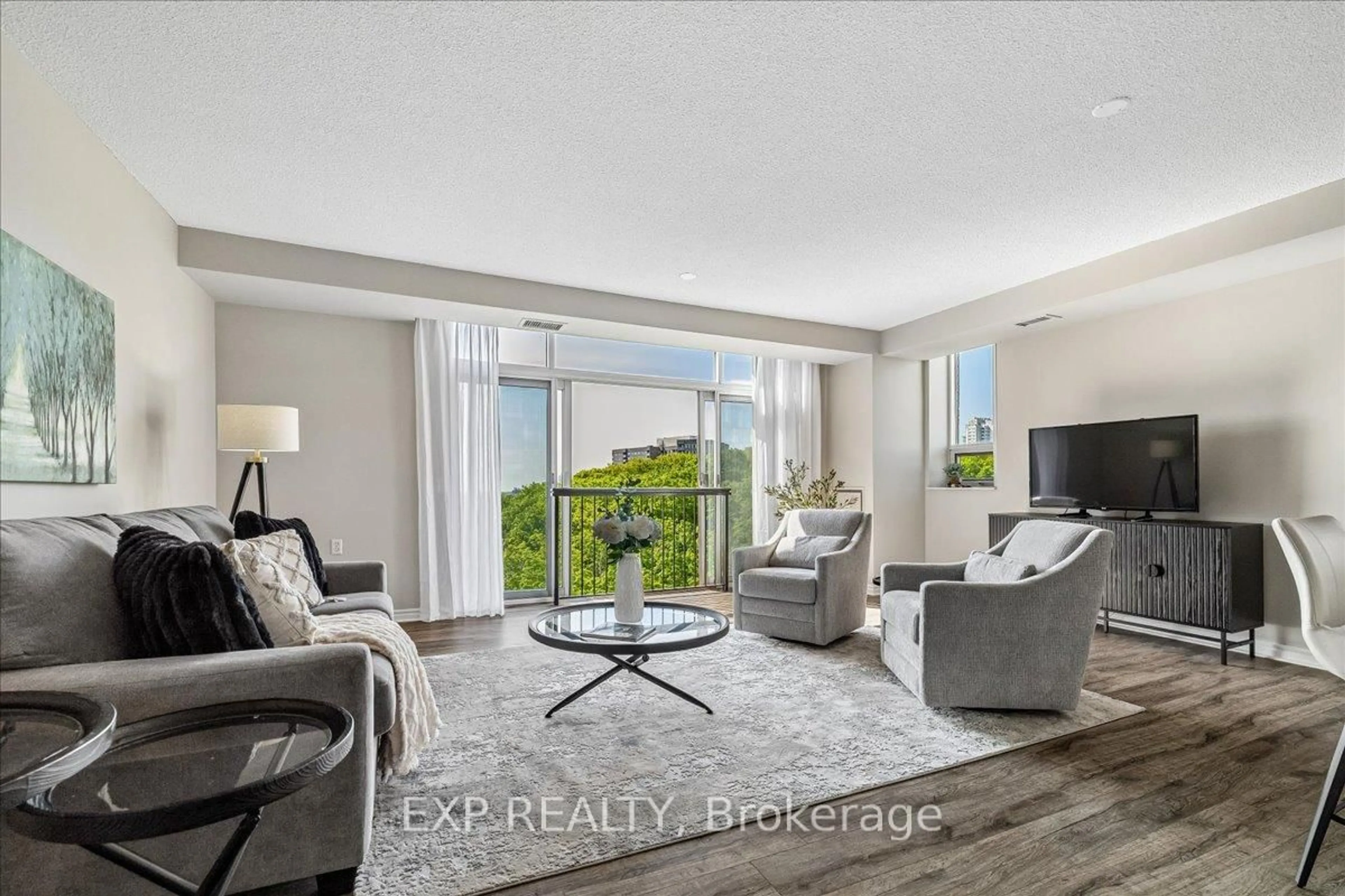 Living room with furniture, unknown for 200 Burnhamthorpe Rd #708, Mississauga Ontario L5A 4L4