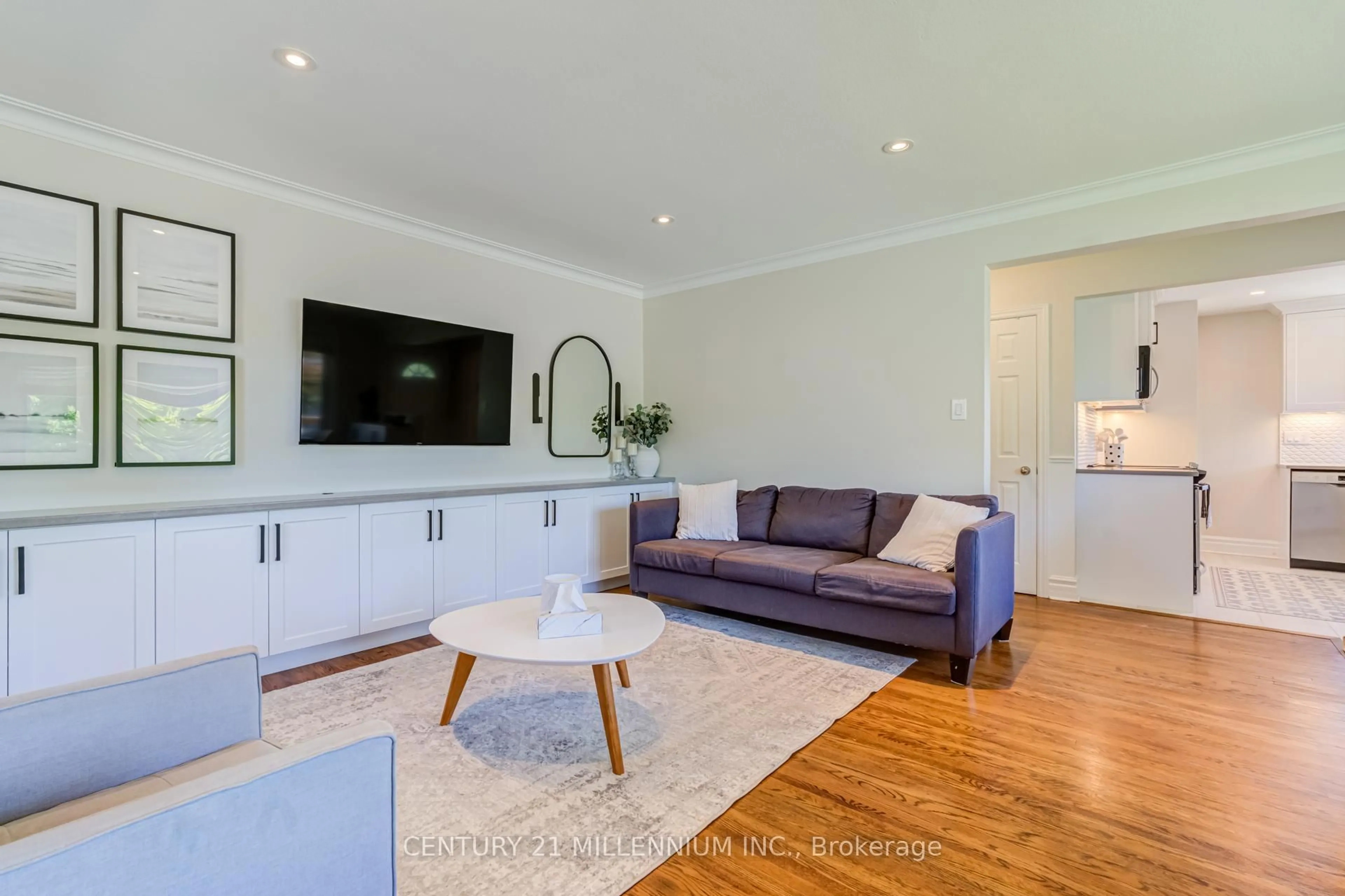 Living room with furniture, wood/laminate floor for 9 Prince Charles Dr, Halton Hills Ontario L7G 3T8
