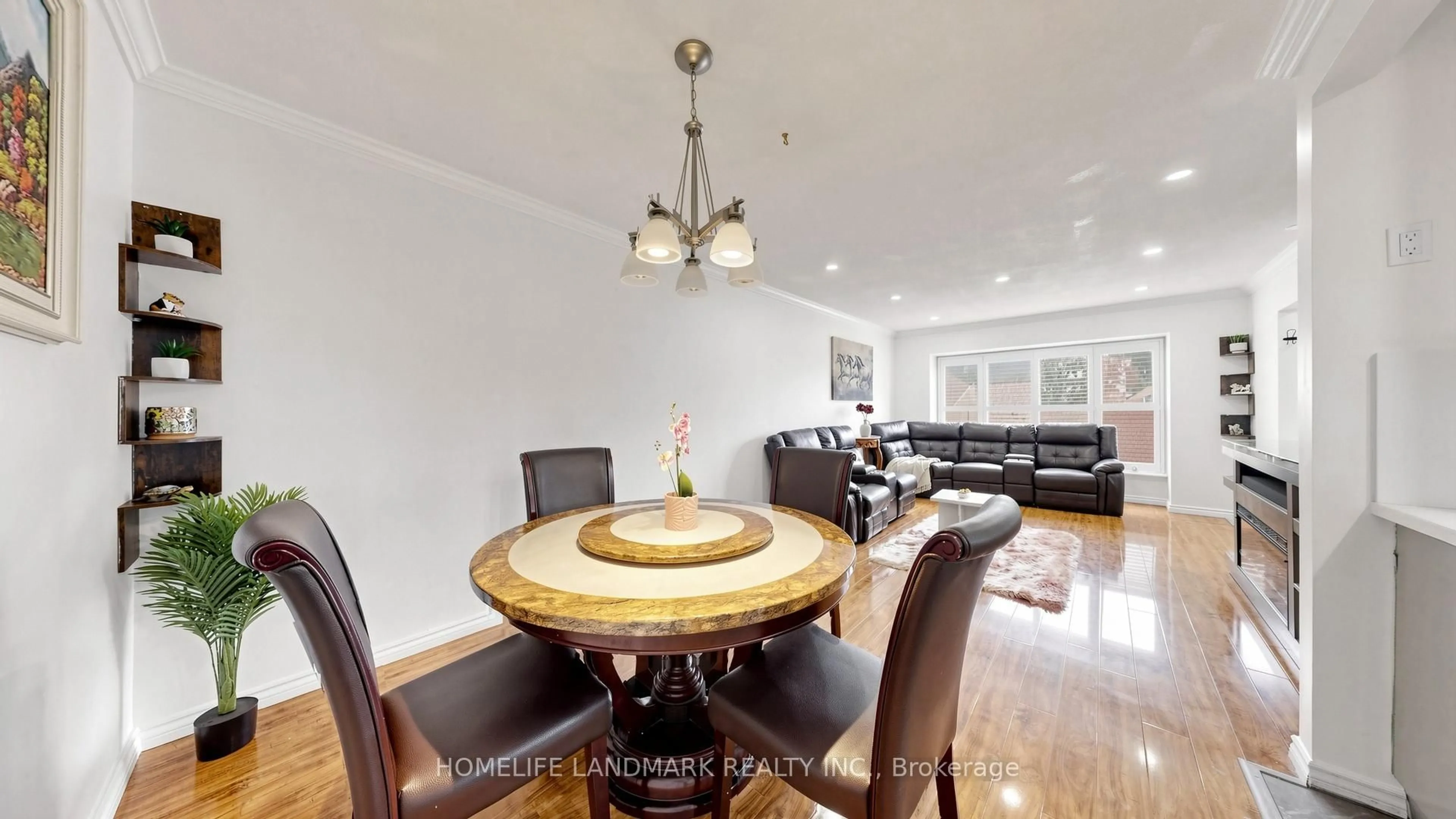 Dining room, wood/laminate floor for 42 Glenmore Cres, Brampton Ontario L6S 1H8