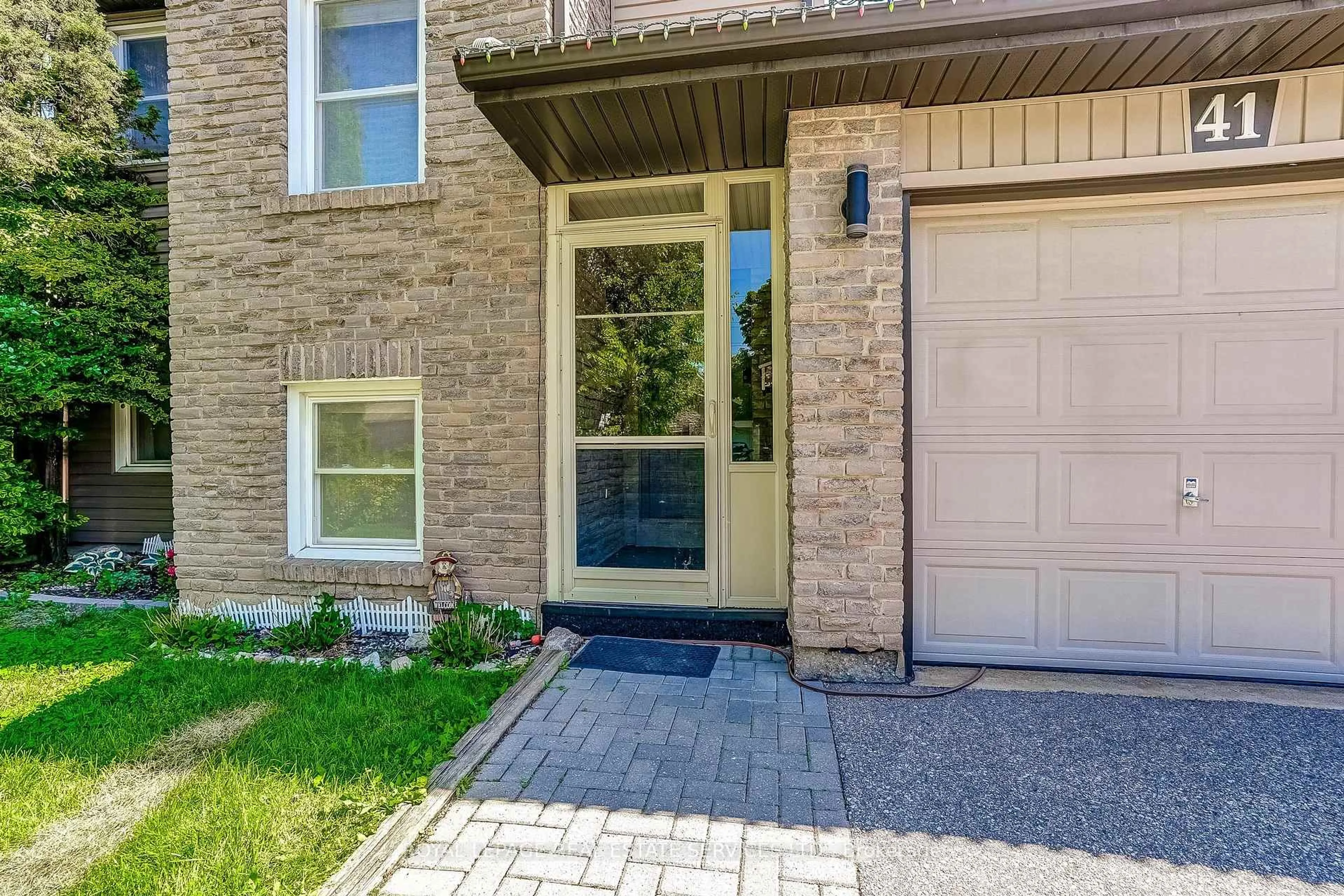 Home with brick exterior material, street for 41 Neuchatel Pl #41, Mississauga Ontario L5N 6A7