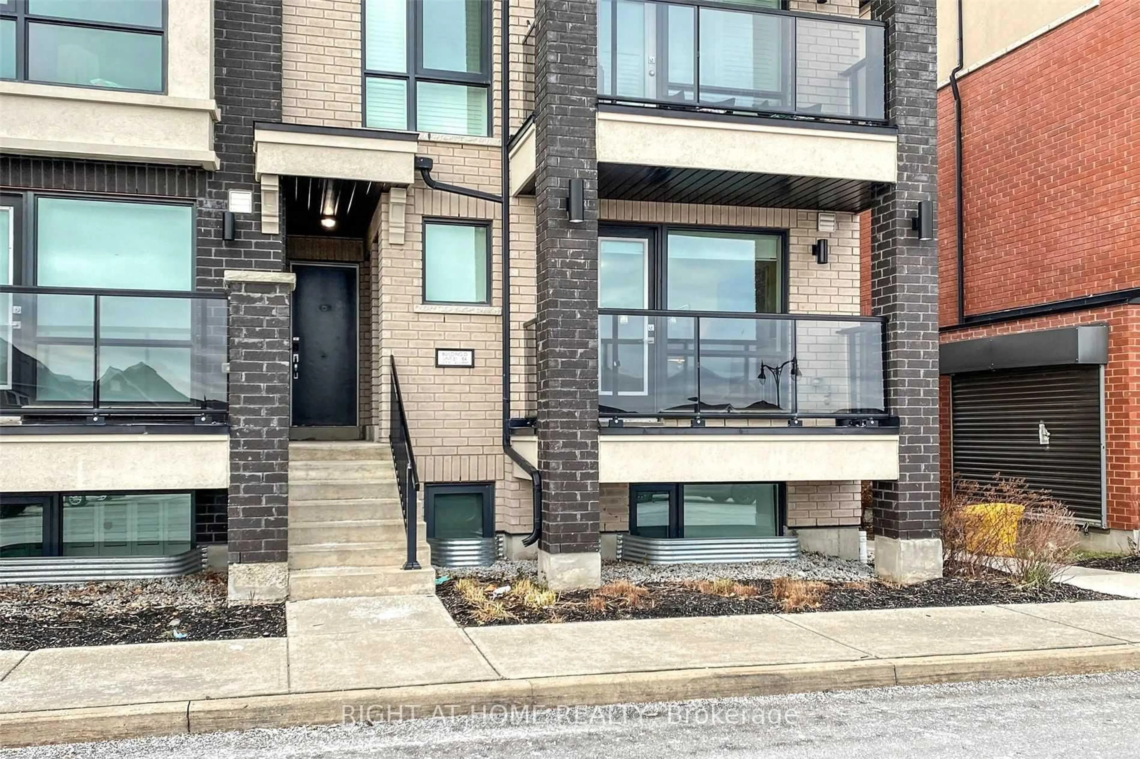 Home with brick exterior material, street for 100 Dufay Rd #82, Brampton Ontario L7A 4S3