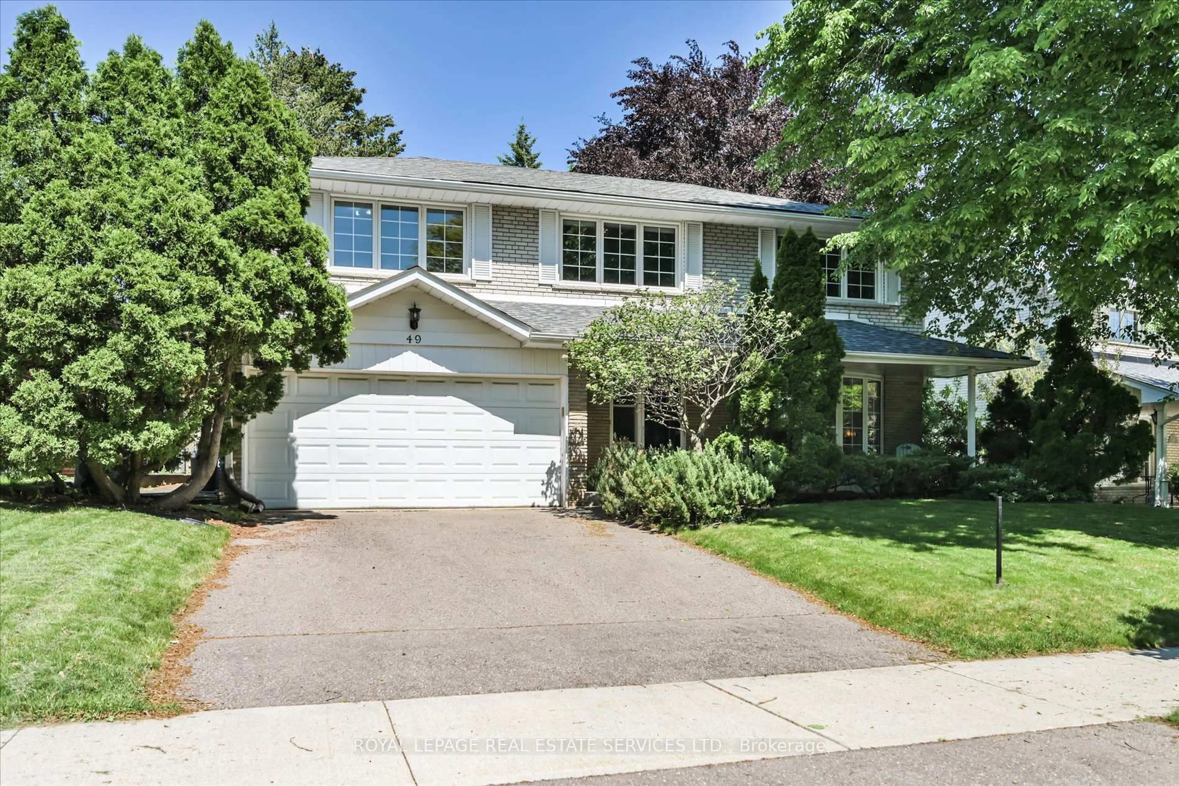 Home with vinyl exterior material, street for 49 Pettit Dr, Toronto Ontario M9R 2W6