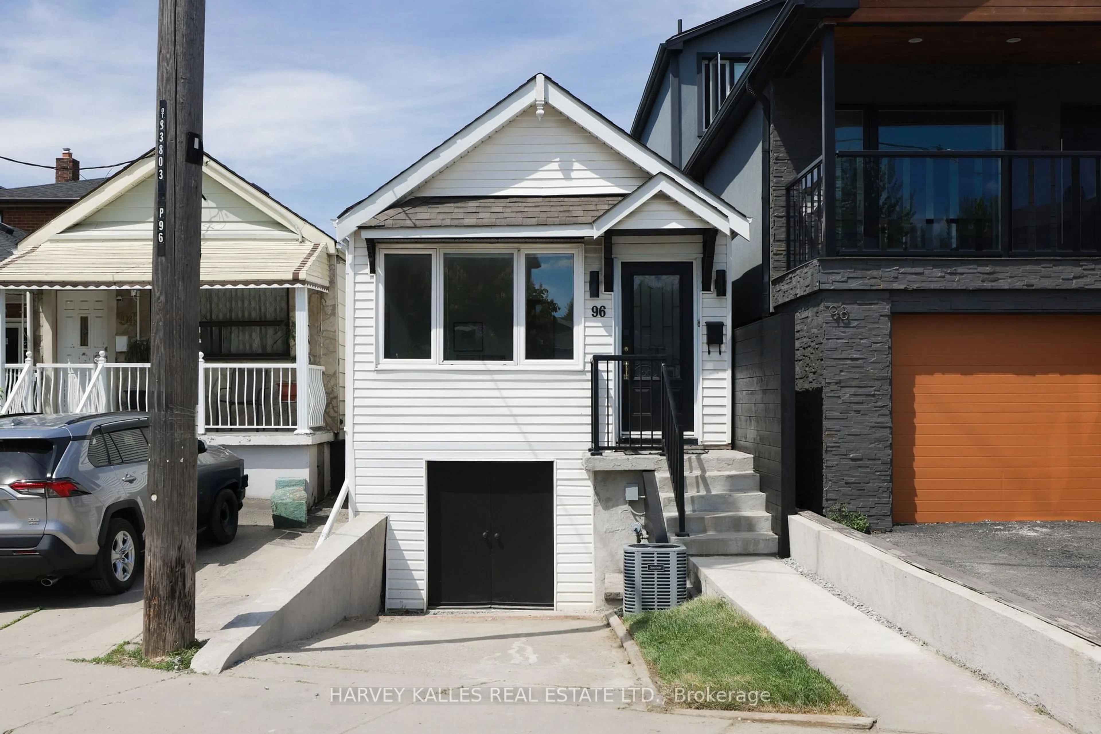 Home with vinyl exterior material, street for 96 Ennerdale Rd, Toronto Ontario M6E 4C6