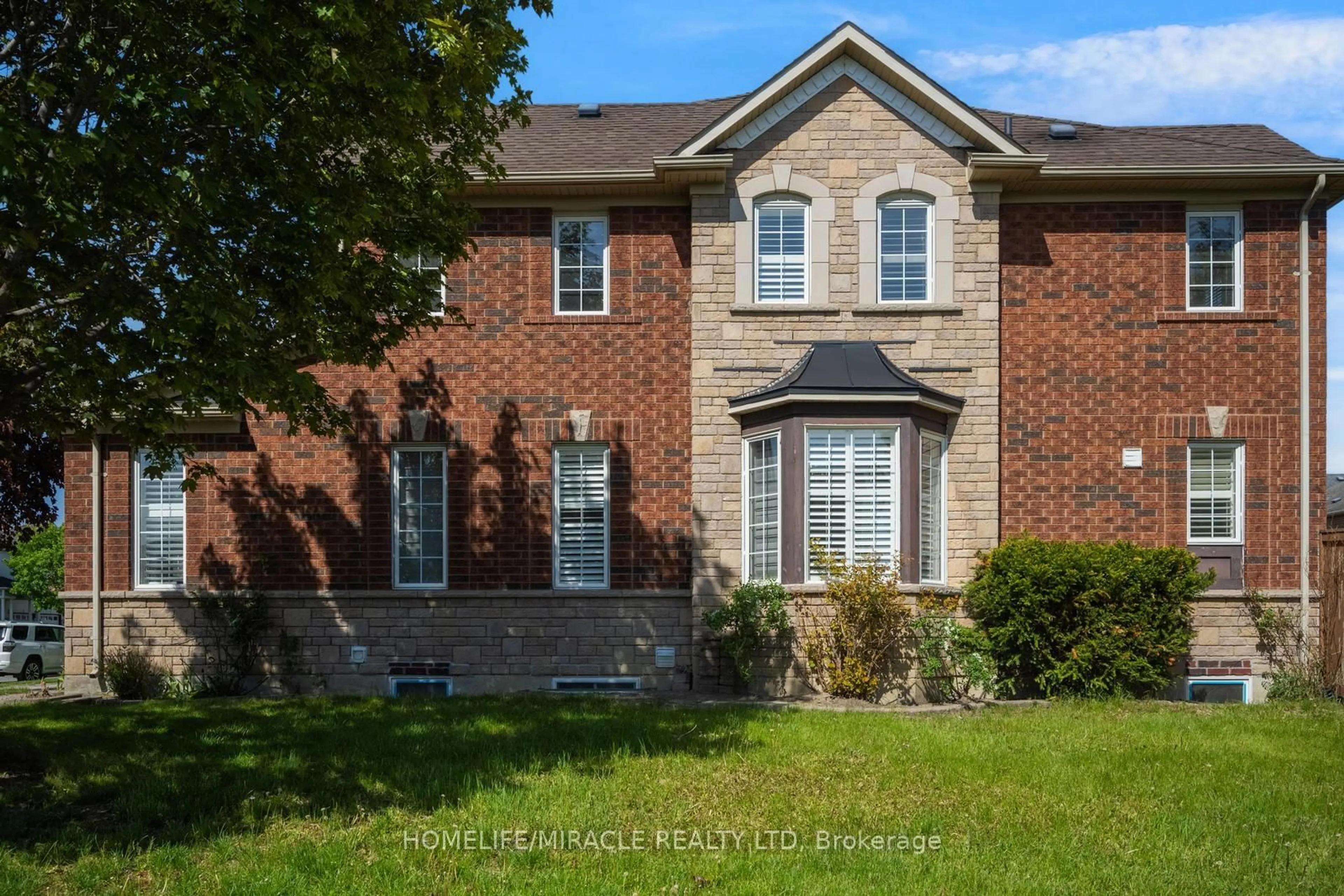 Home with brick exterior material, street for 17 Latania Blvd, Brampton Ontario L6P 1S8