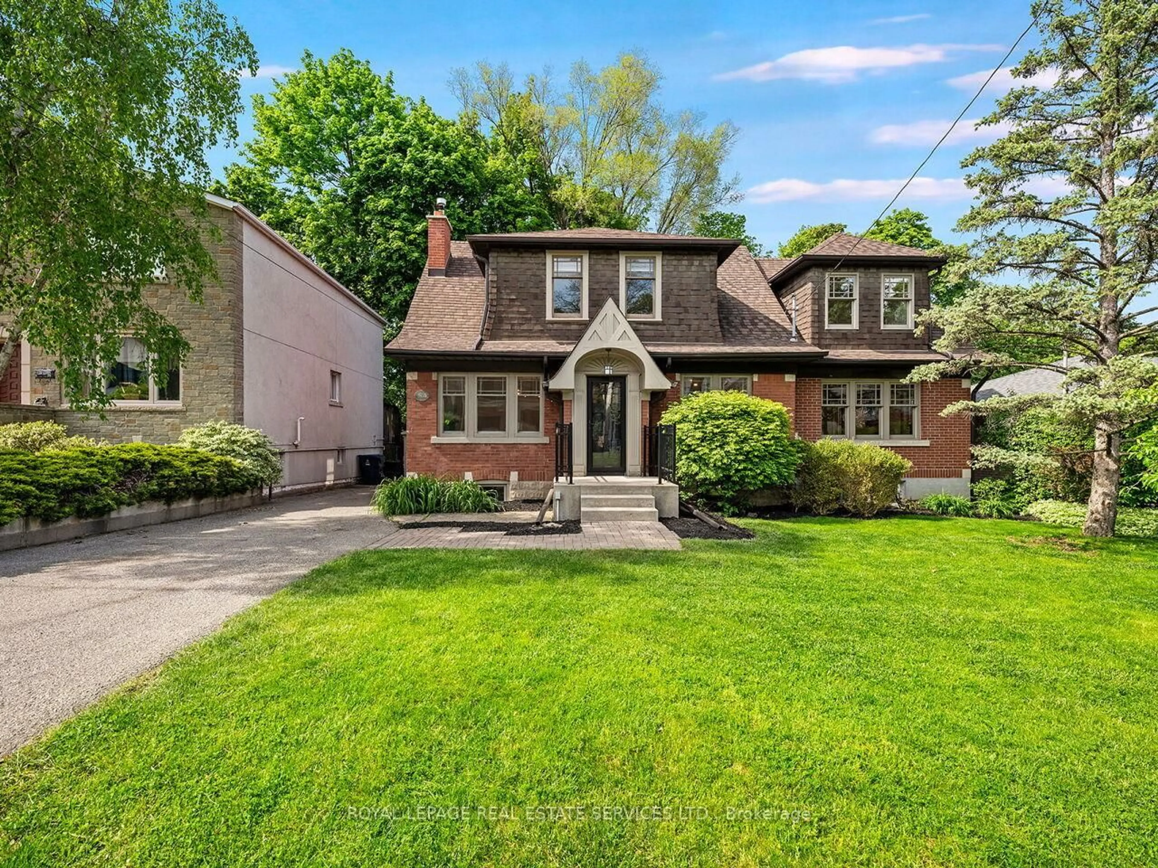 Home with brick exterior material, street for 54 Oakfield Dr, Toronto Ontario M8Y 1N8