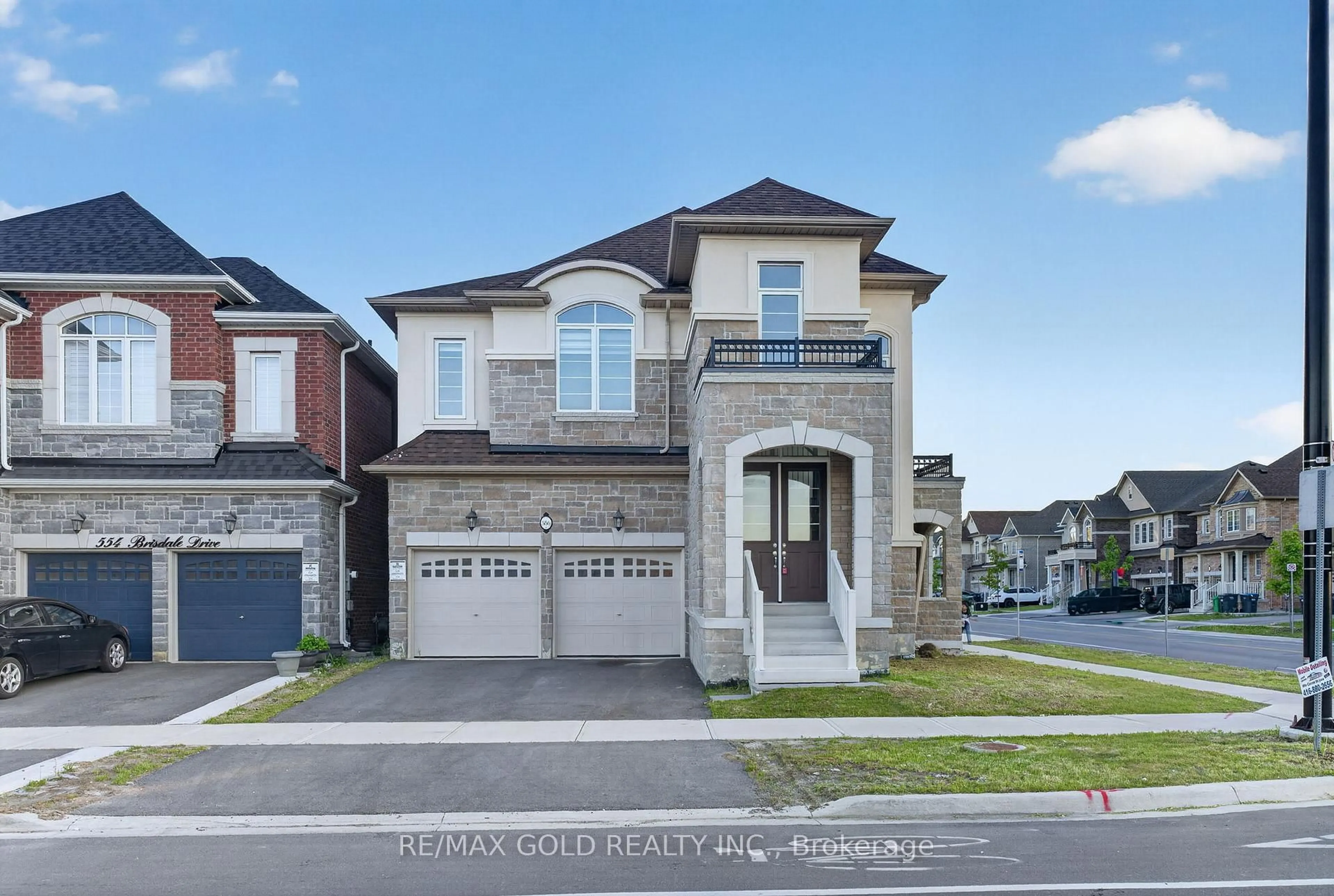 Home with brick exterior material, street for 556 Brisdale Dr, Brampton Ontario L7A 0C3
