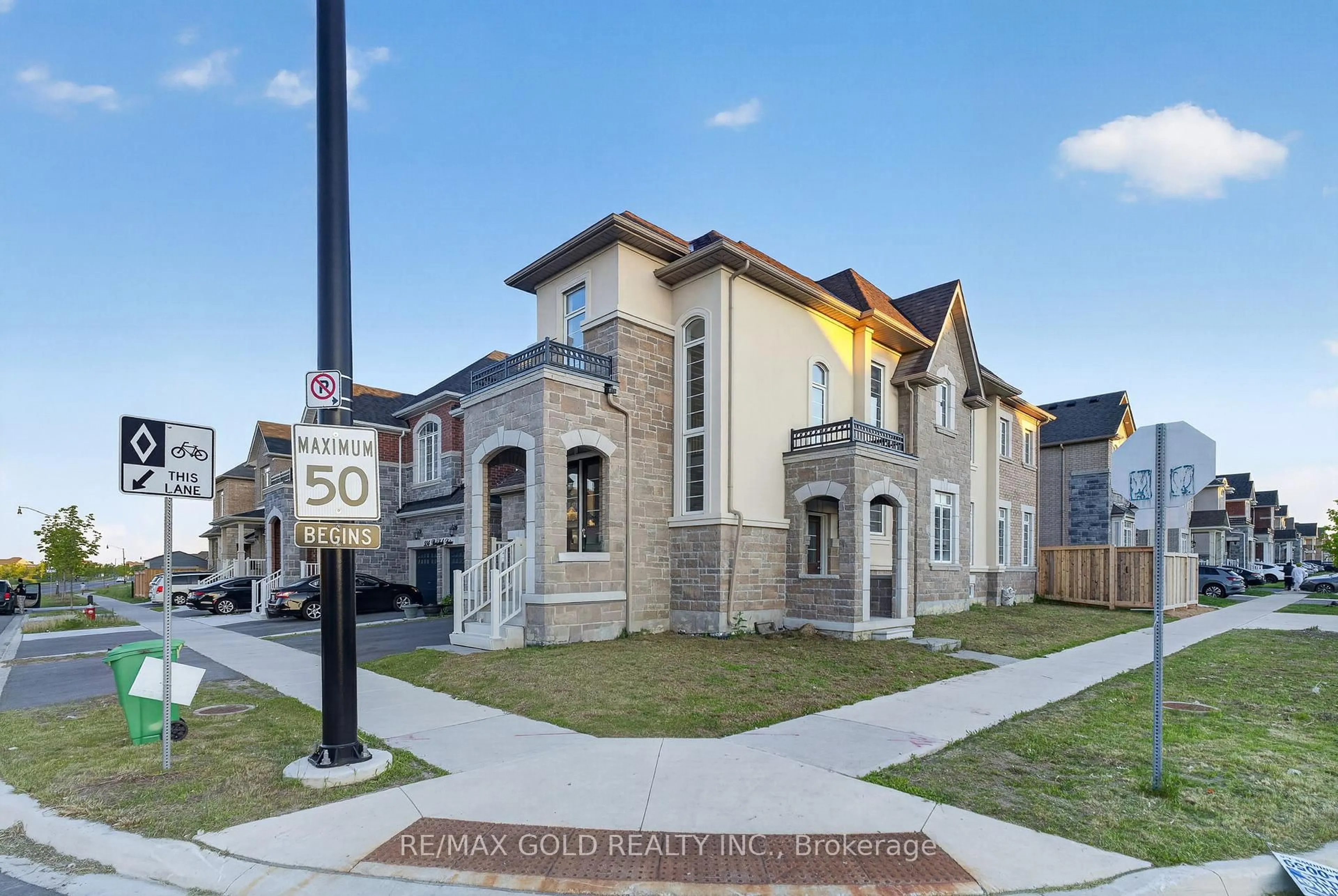 Home with brick exterior material, street for 556 Brisdale Dr, Brampton Ontario L7A 0C3