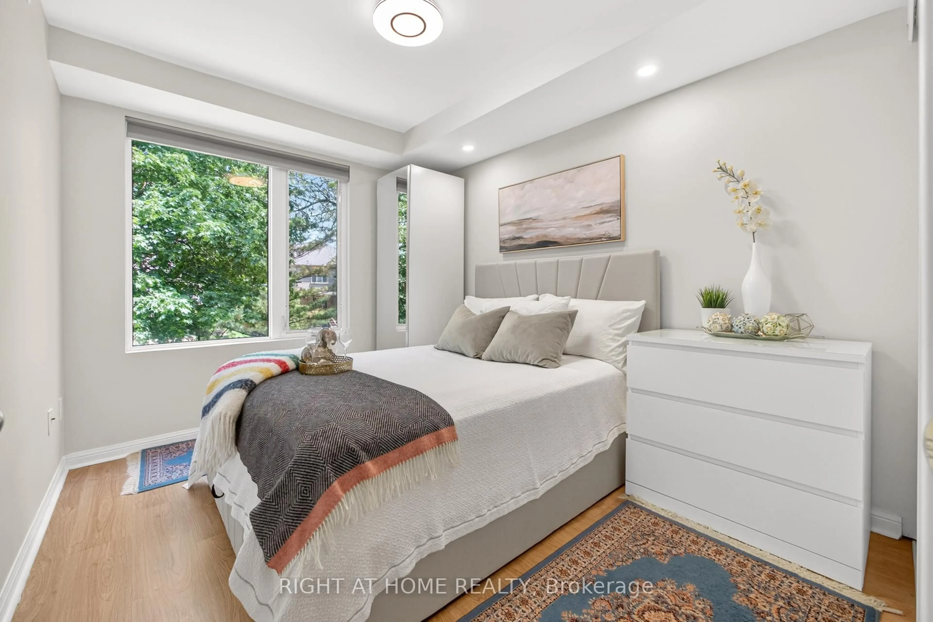 Bedroom with bed, wood/laminate floor for 105 George Appleton Way #2151, Toronto Ontario M3M 0A2