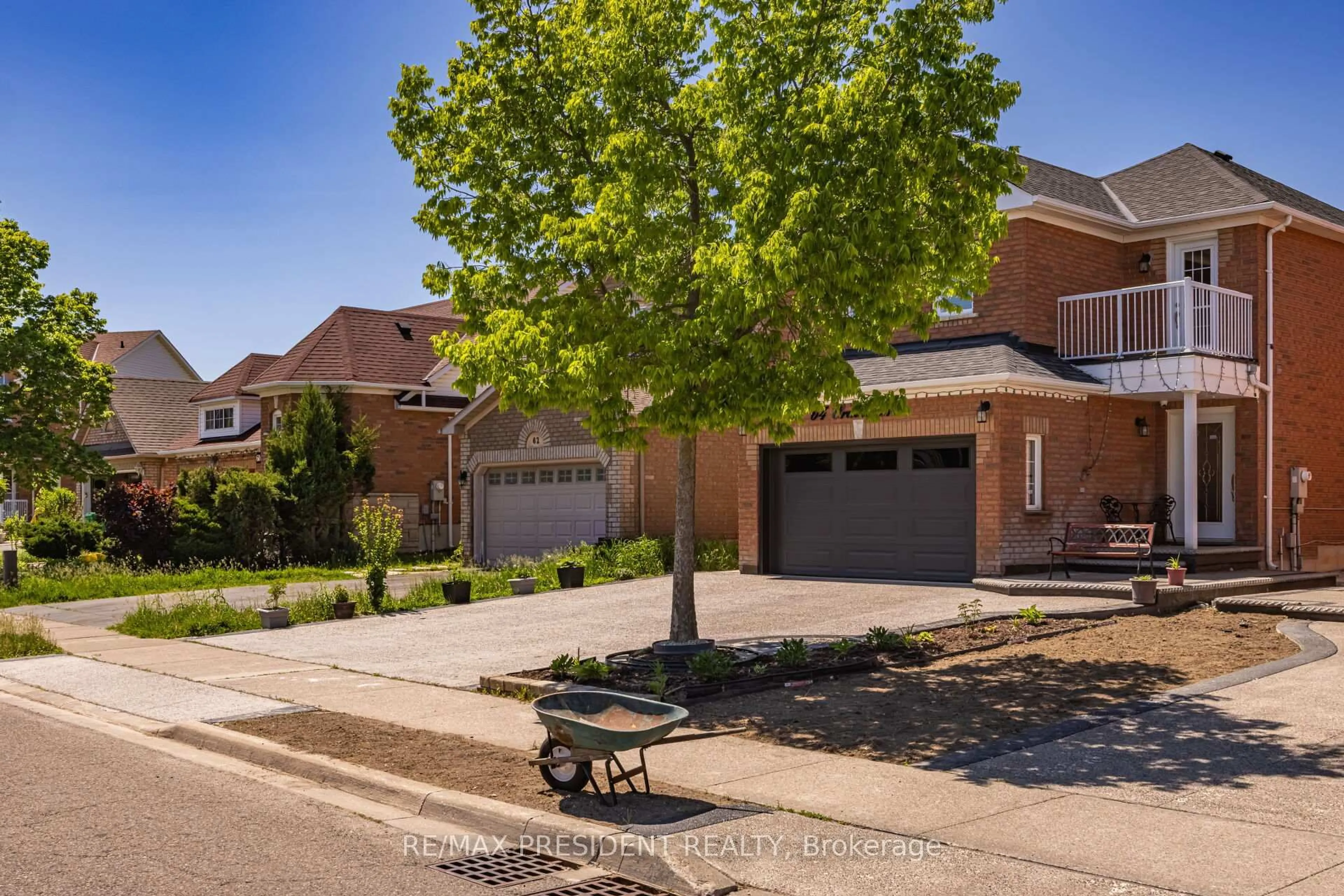 Home with brick exterior material, street for 64 Orchid Dr, Brampton Ontario L7A 2C8