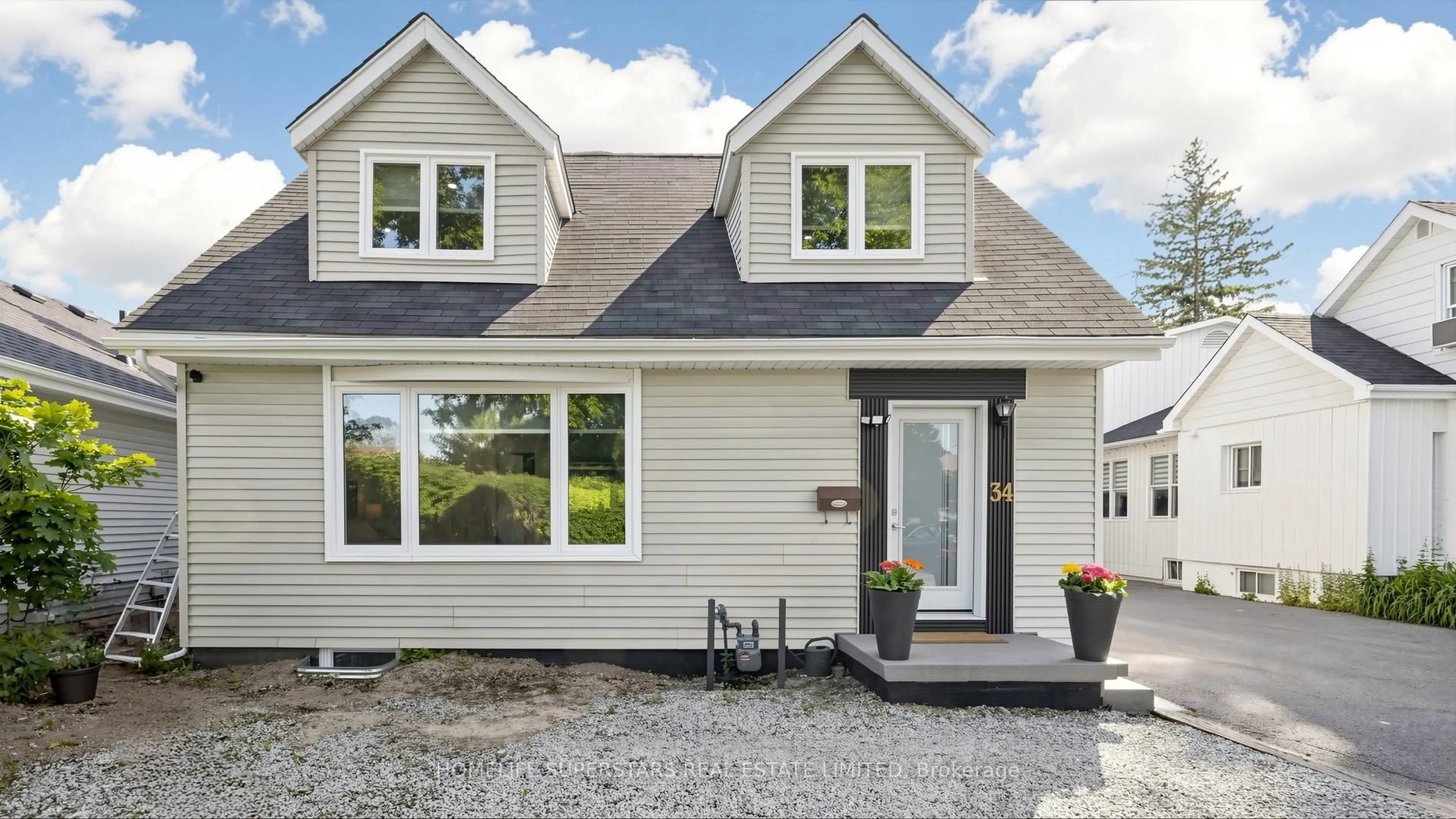 Home with vinyl exterior material, street for 34 Mercer Dr, Brampton Ontario L6X 1B4