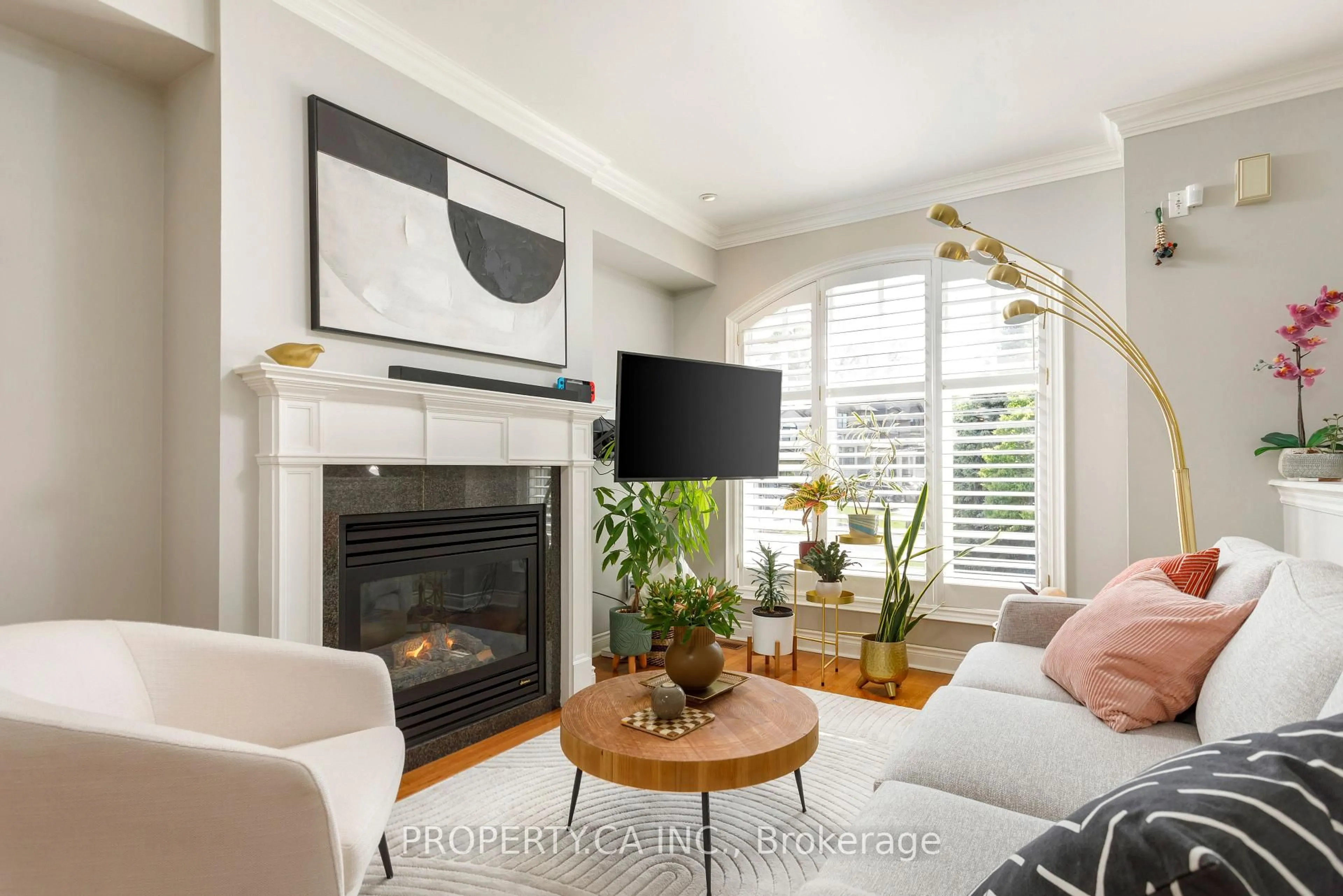 Living room with furniture, wood/laminate floor for 9 Leaves Terr, Toronto Ontario M8Y 4H4
