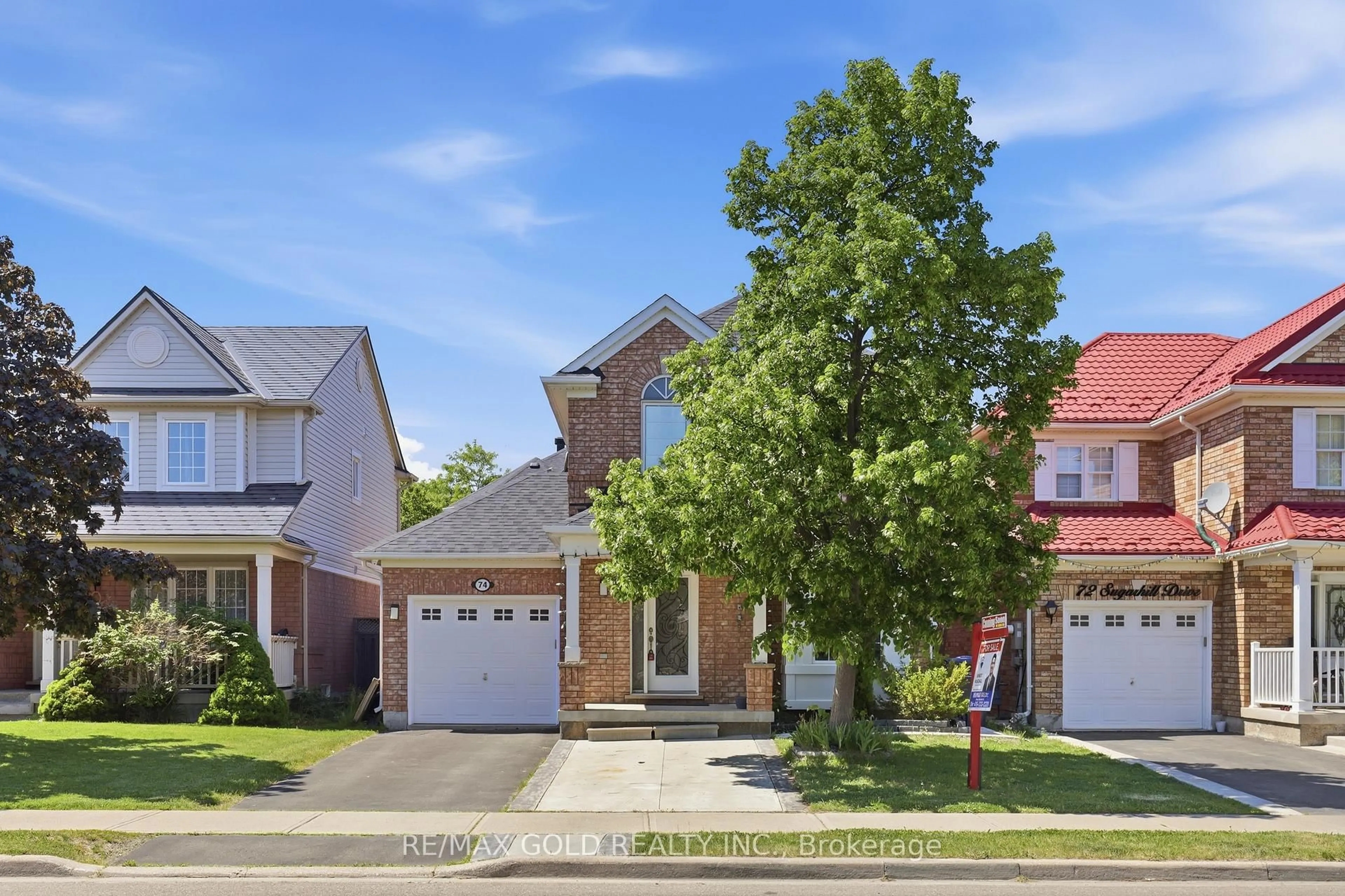 Home with brick exterior material, street for 74 Sugarhill Dr, Brampton Ontario L7A 3N2
