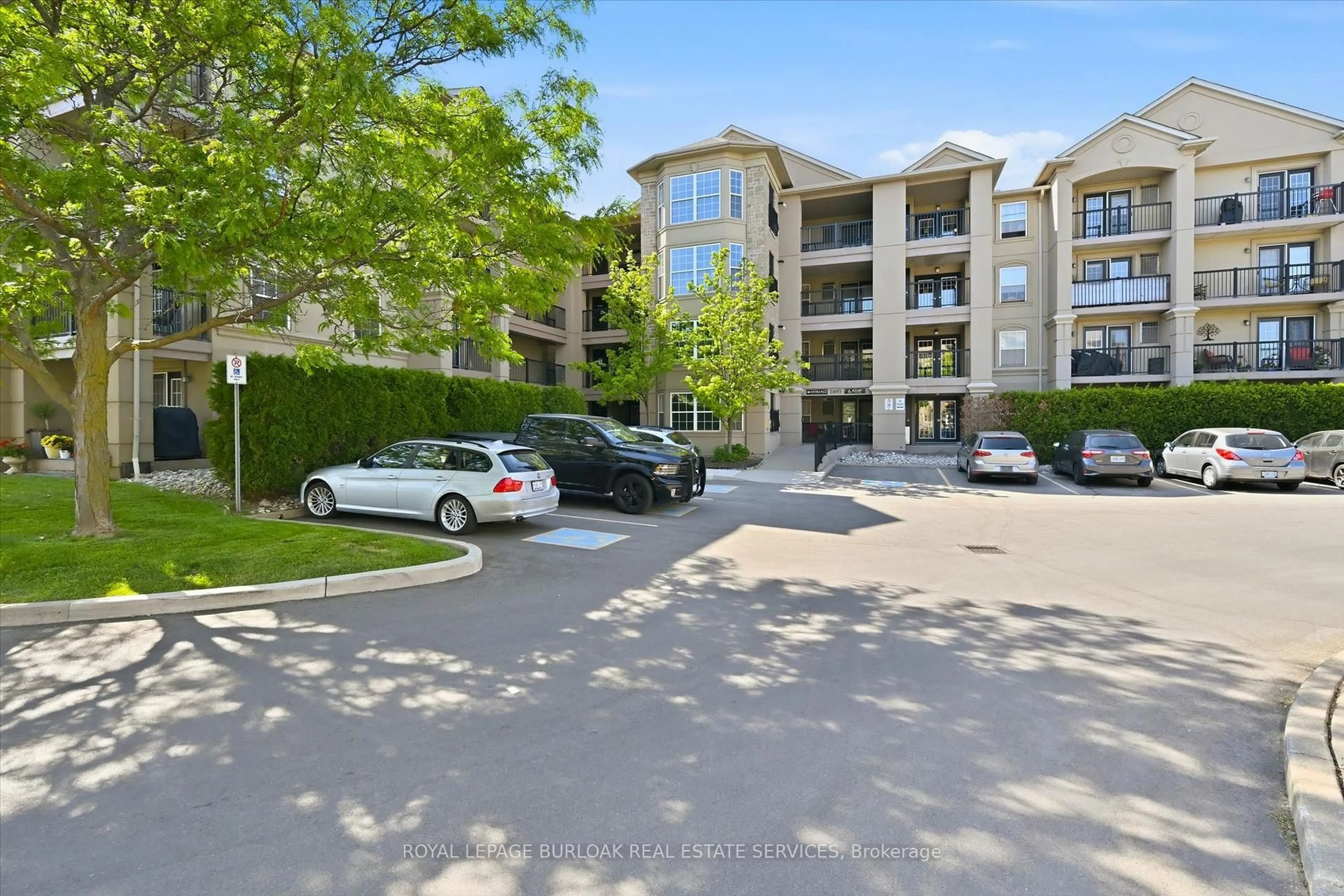 A pic from outside/outdoor area/front of a property/back of a property/a pic from drone, street for 2085 Appleby Line #107, Burlington Ontario L7L 7H4