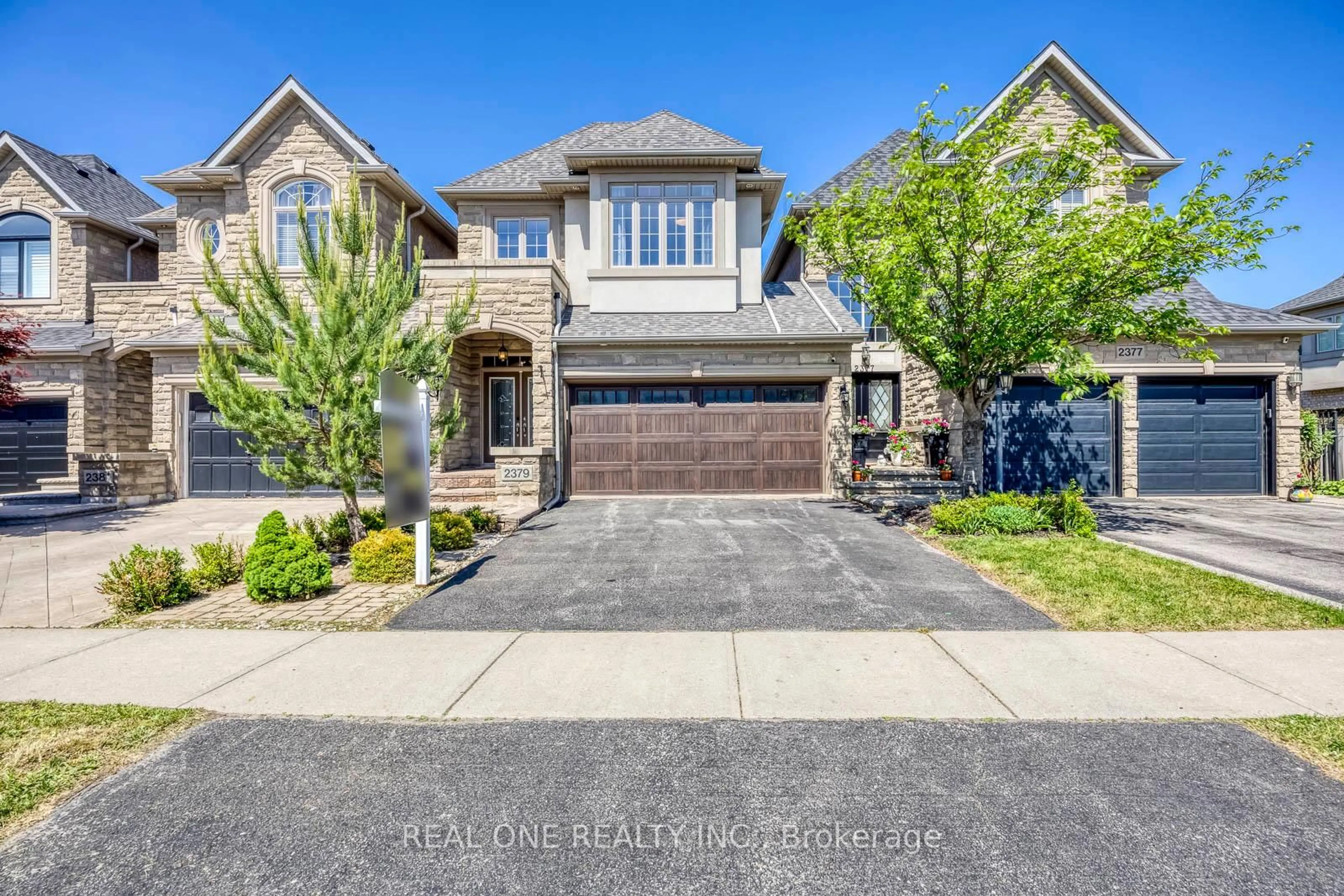Home with brick exterior material, street for 2379 Wasaga Dr, Oakville Ontario L6H 0B7
