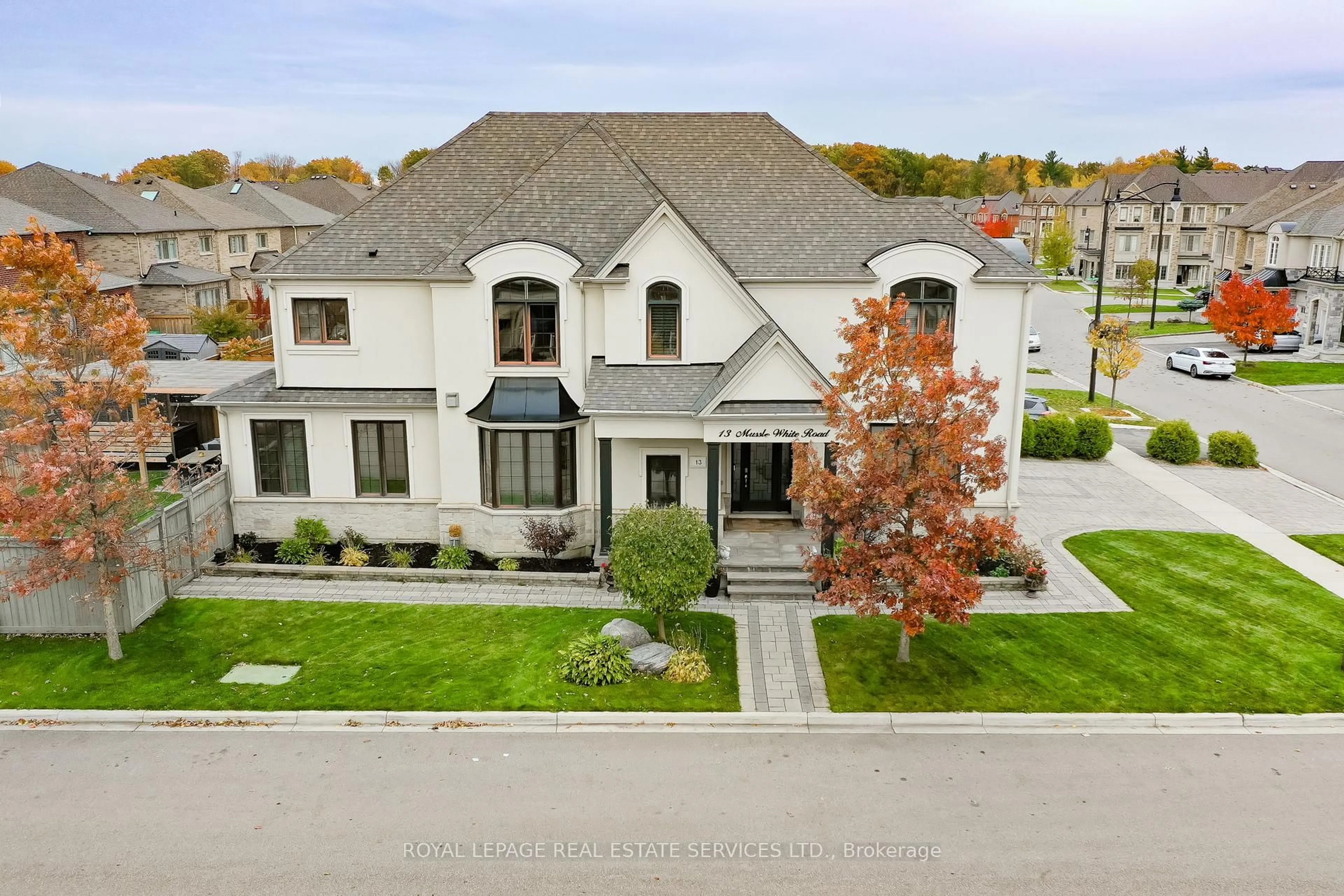 A pic from outside/outdoor area/front of a property/back of a property/a pic from drone, street for 13 Mussle White Rd, Brampton Ontario L6Y 6C3