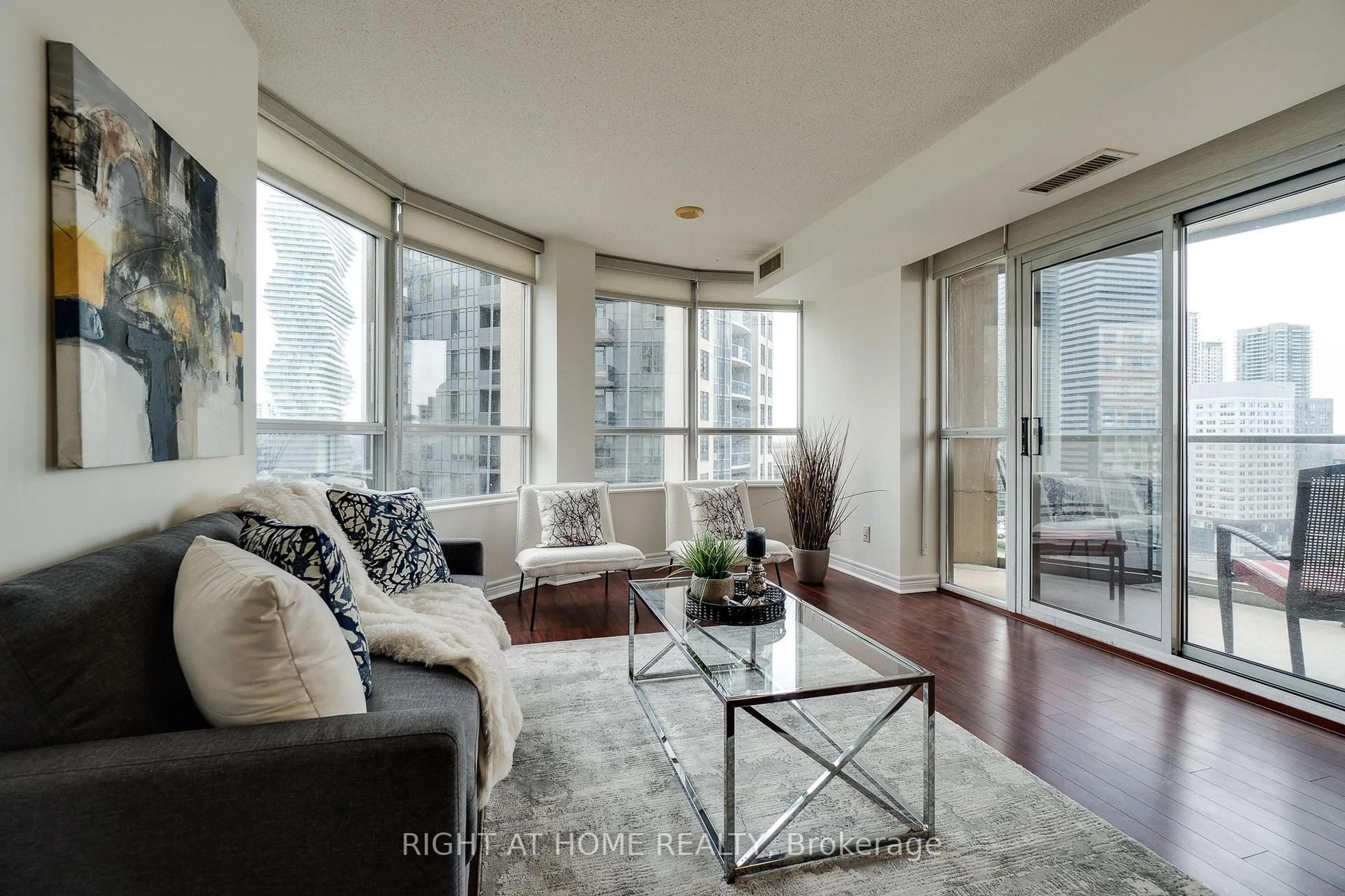 Living room with furniture, unknown for 310 Burnhamthorpe Rd #1713, Mississauga Ontario L5B 4P9