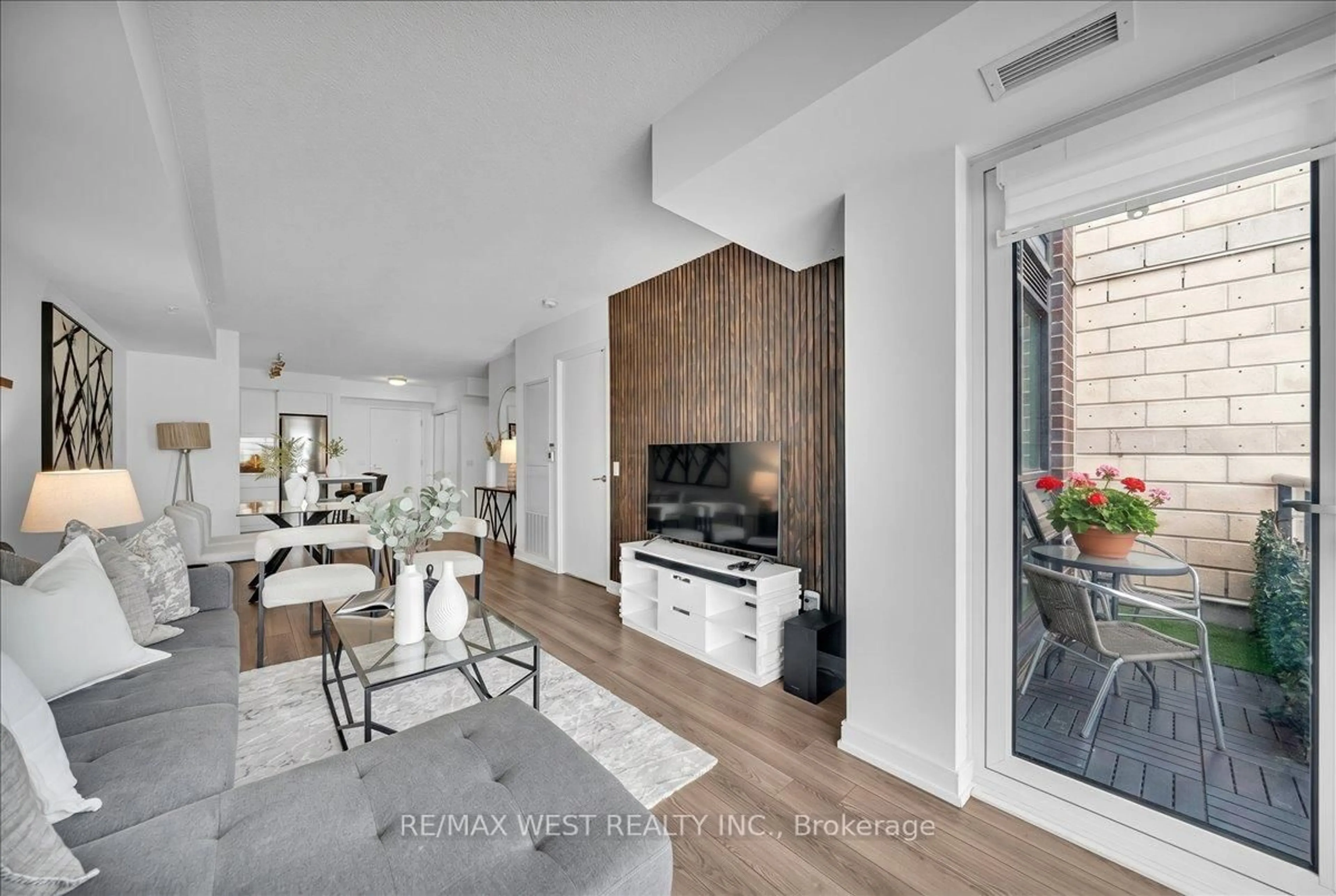 Living room with furniture, unknown for 20 Thomas Riley Rd #306, Toronto Ontario M9B 0C3