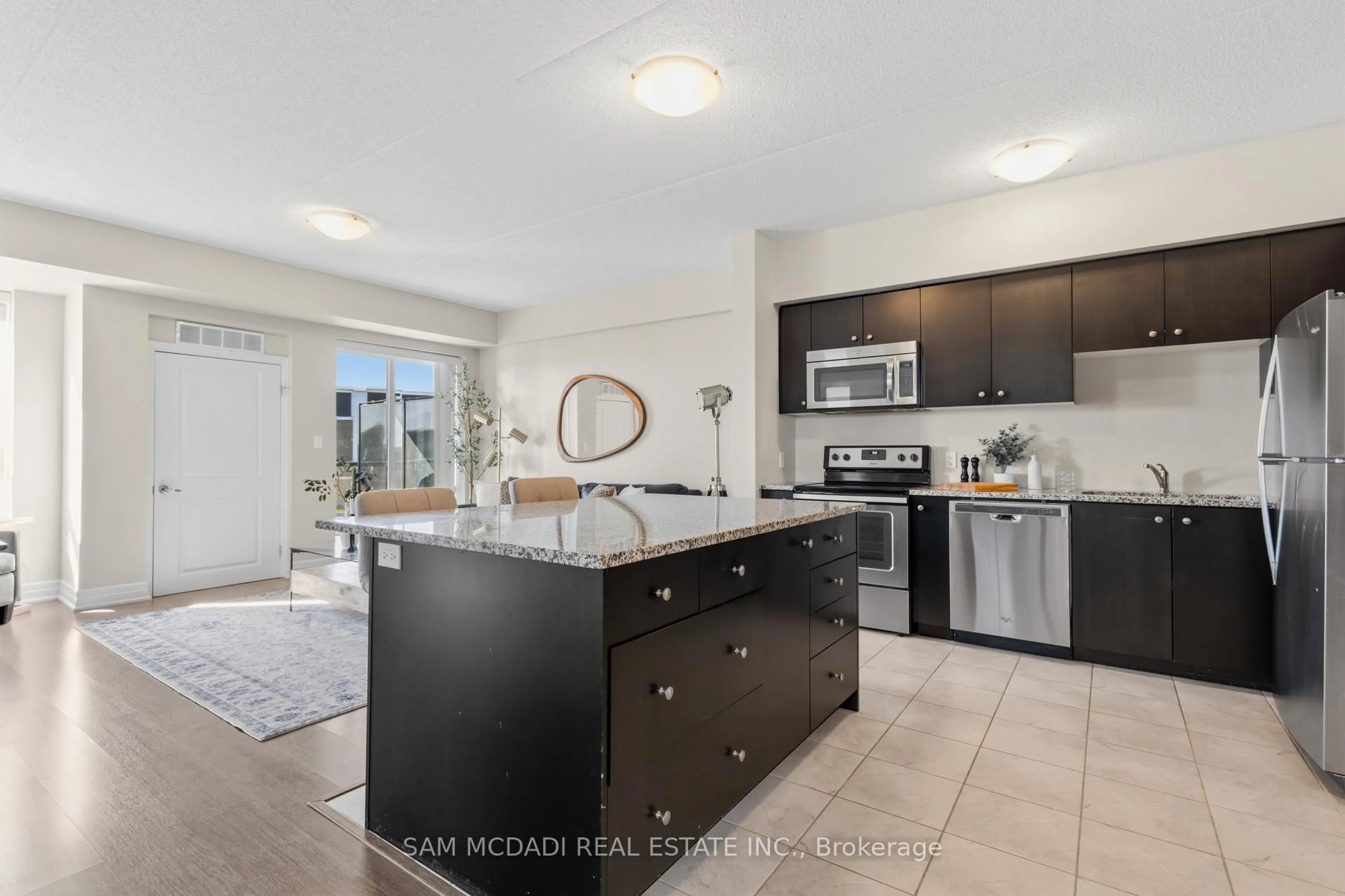 Open concept kitchen, ceramic/tile floor for 650 Sauve St #314, Milton Ontario L9T 9A8