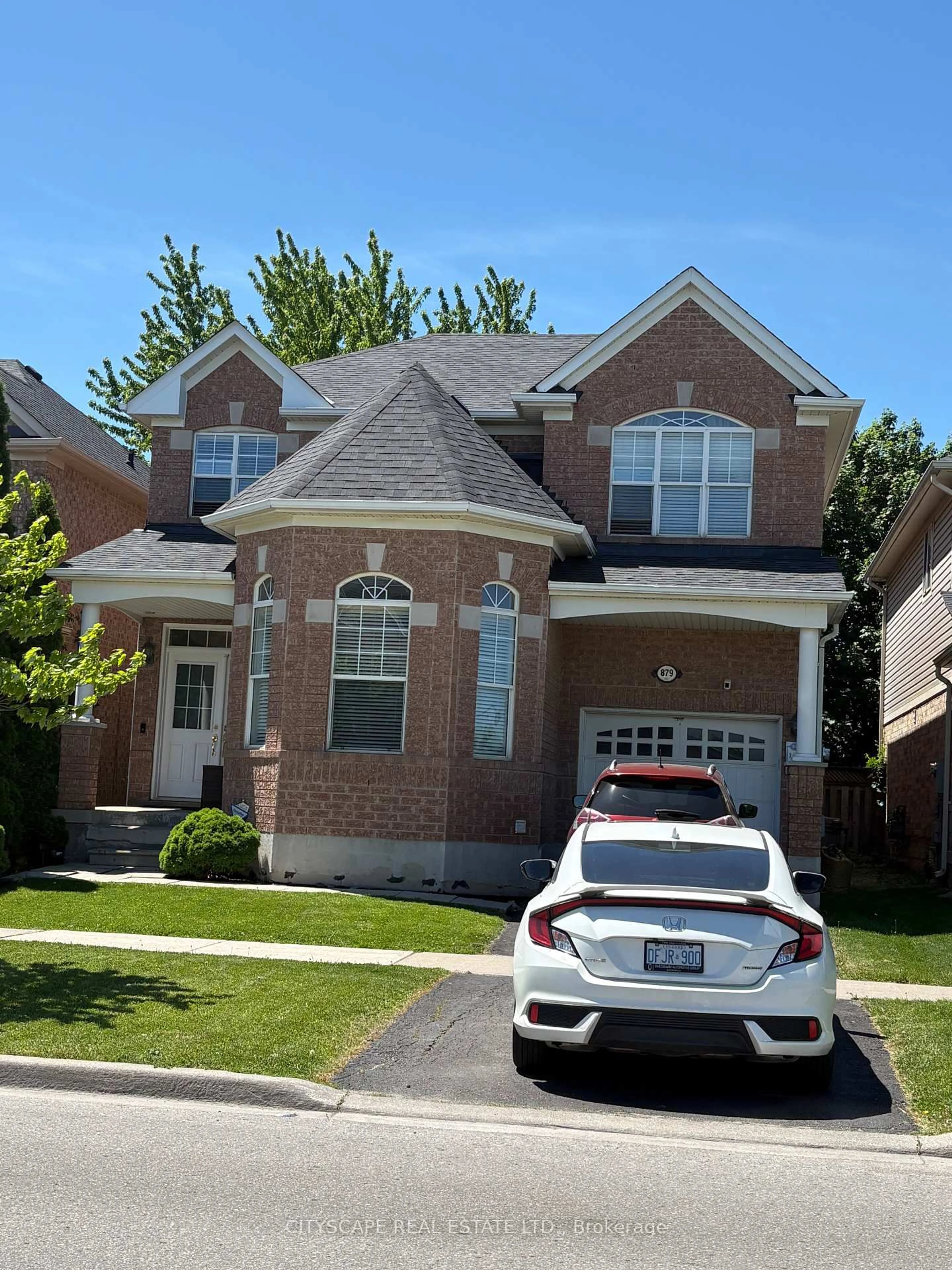 Home with brick exterior material, street for 879 Bennett Blvd, Milton Ontario L9T 6X9