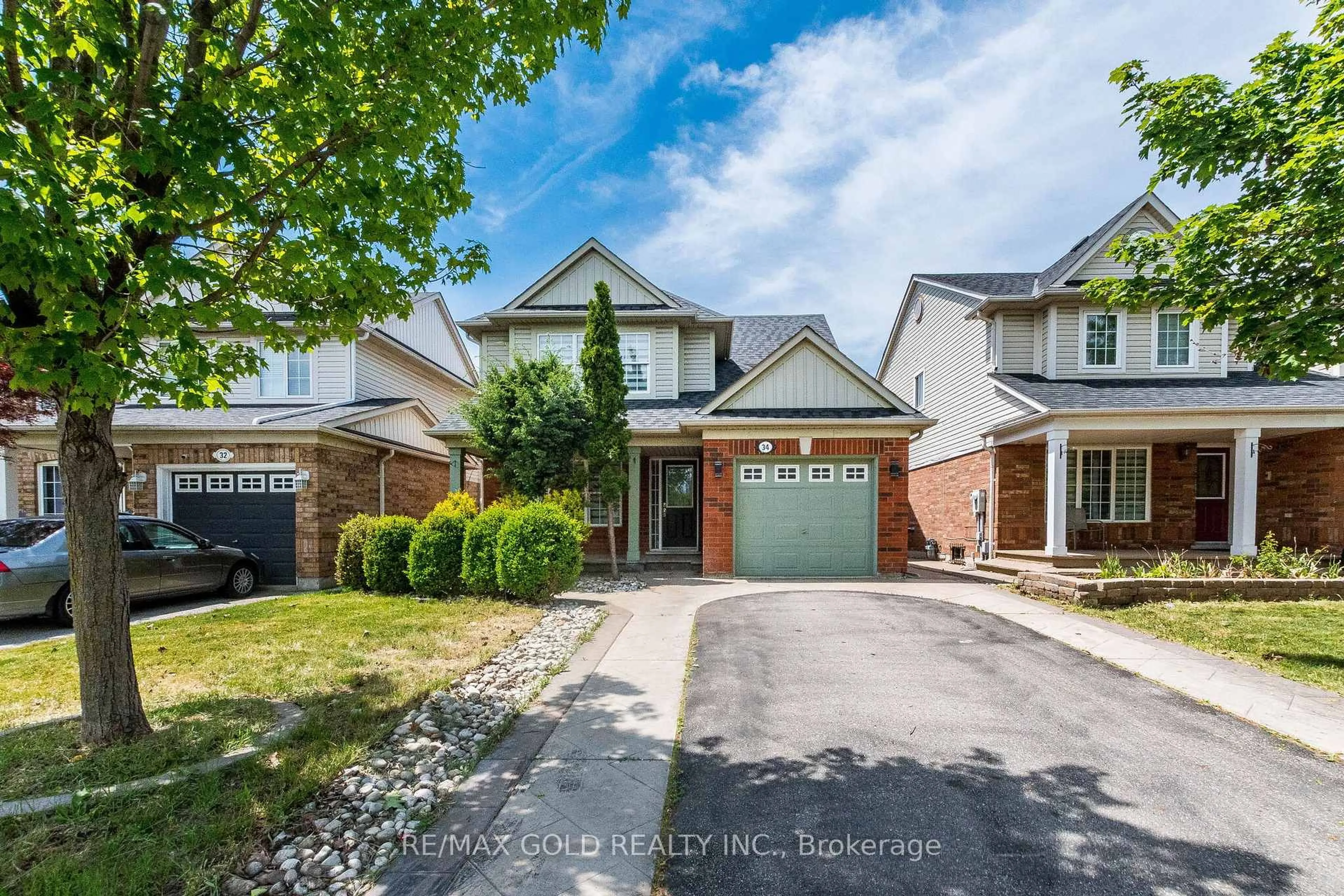 Home with brick exterior material, street for 34 Worthington Ave, Brampton Ontario L7A 1M9