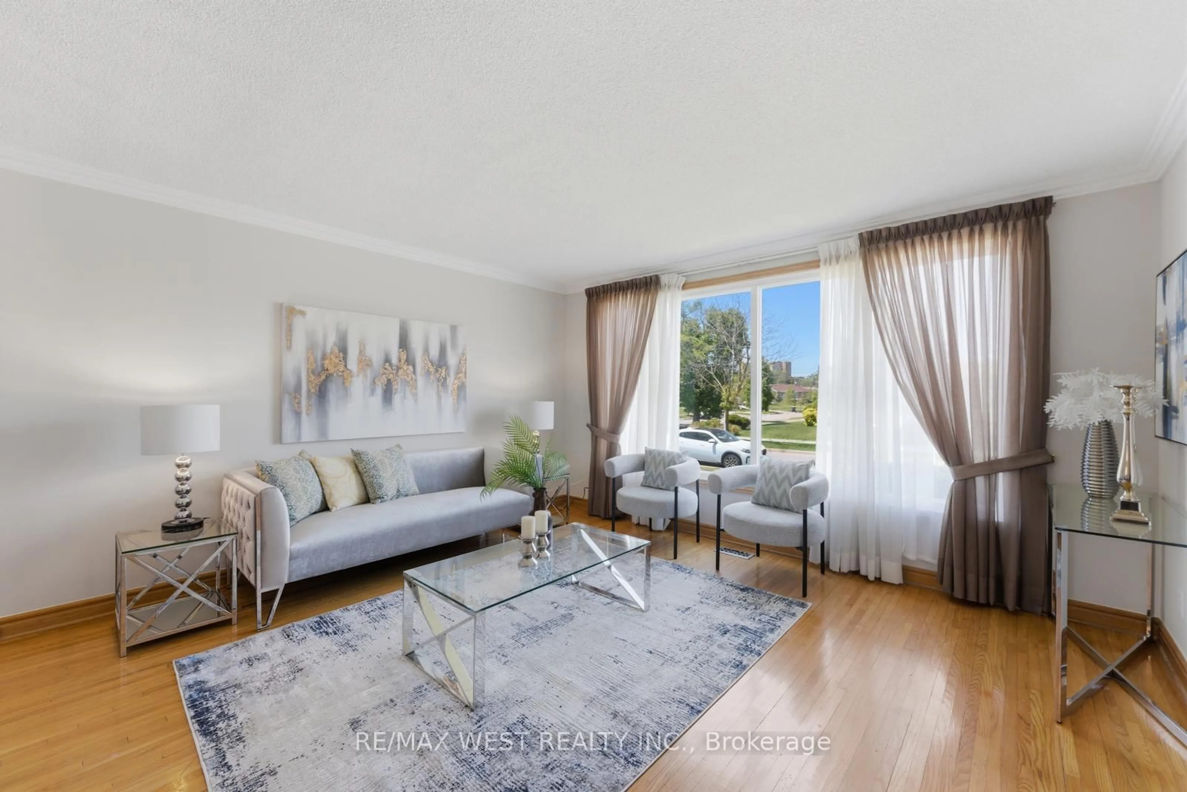 Living room with furniture, wood/laminate floor for 37 Beaumonde Heights Dr, Toronto Ontario M9V 1V7