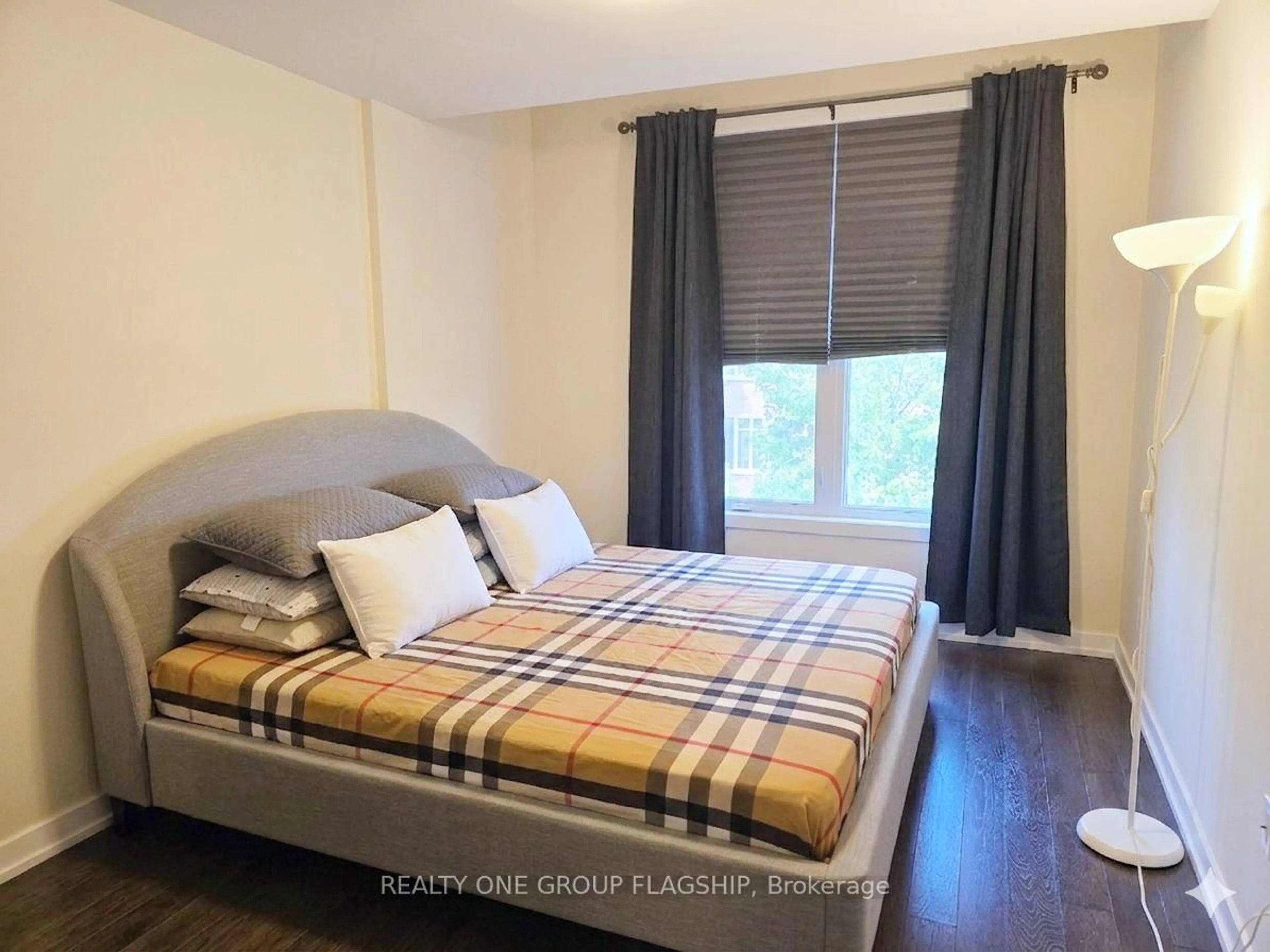 Bedroom with bed, wood/laminate floor for 2355 Sheppard Ave #234, Toronto Ontario M9M 0E7