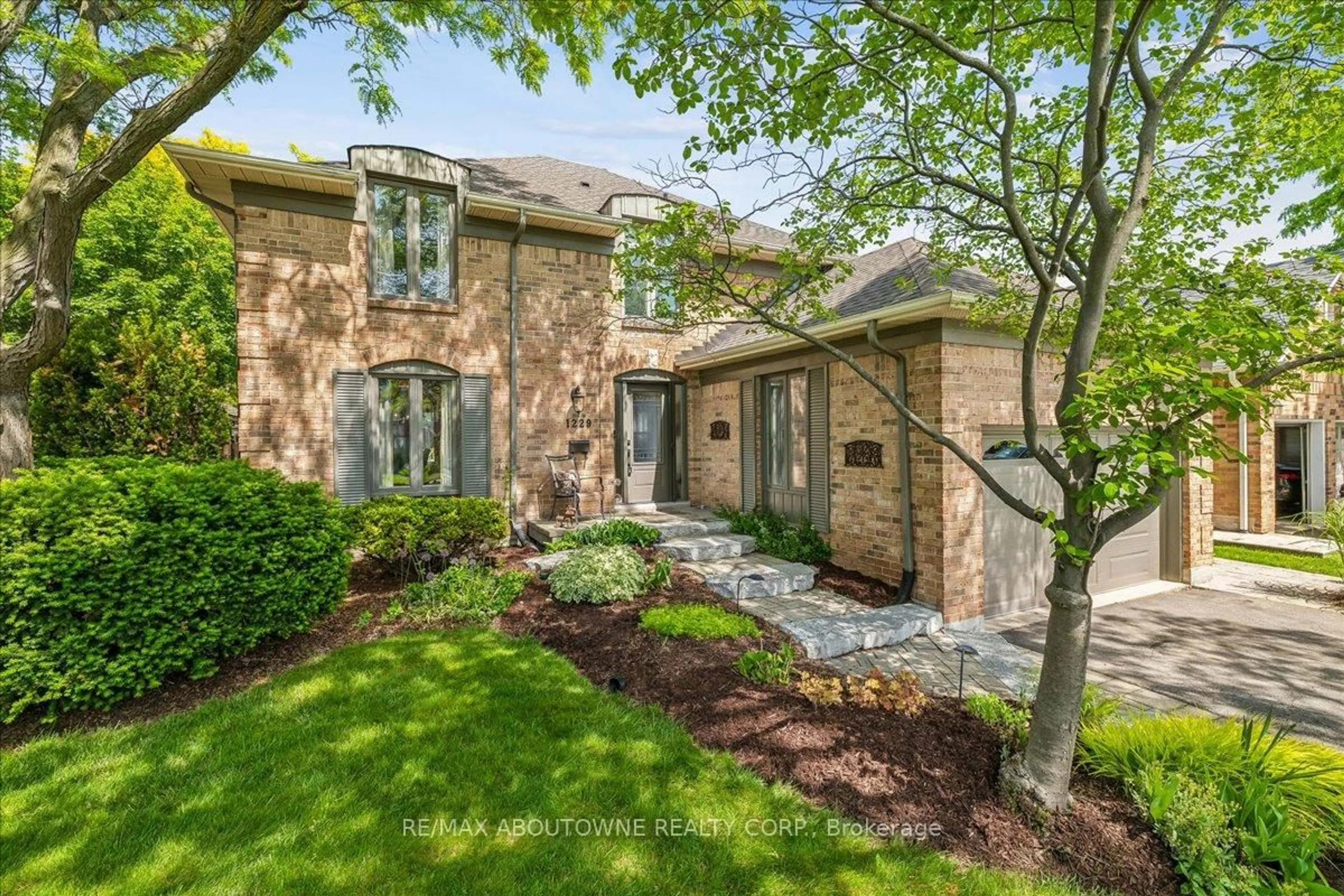 Home with brick exterior material, street for 1229 Old Post Dr, Oakville Ontario L6M 1A5