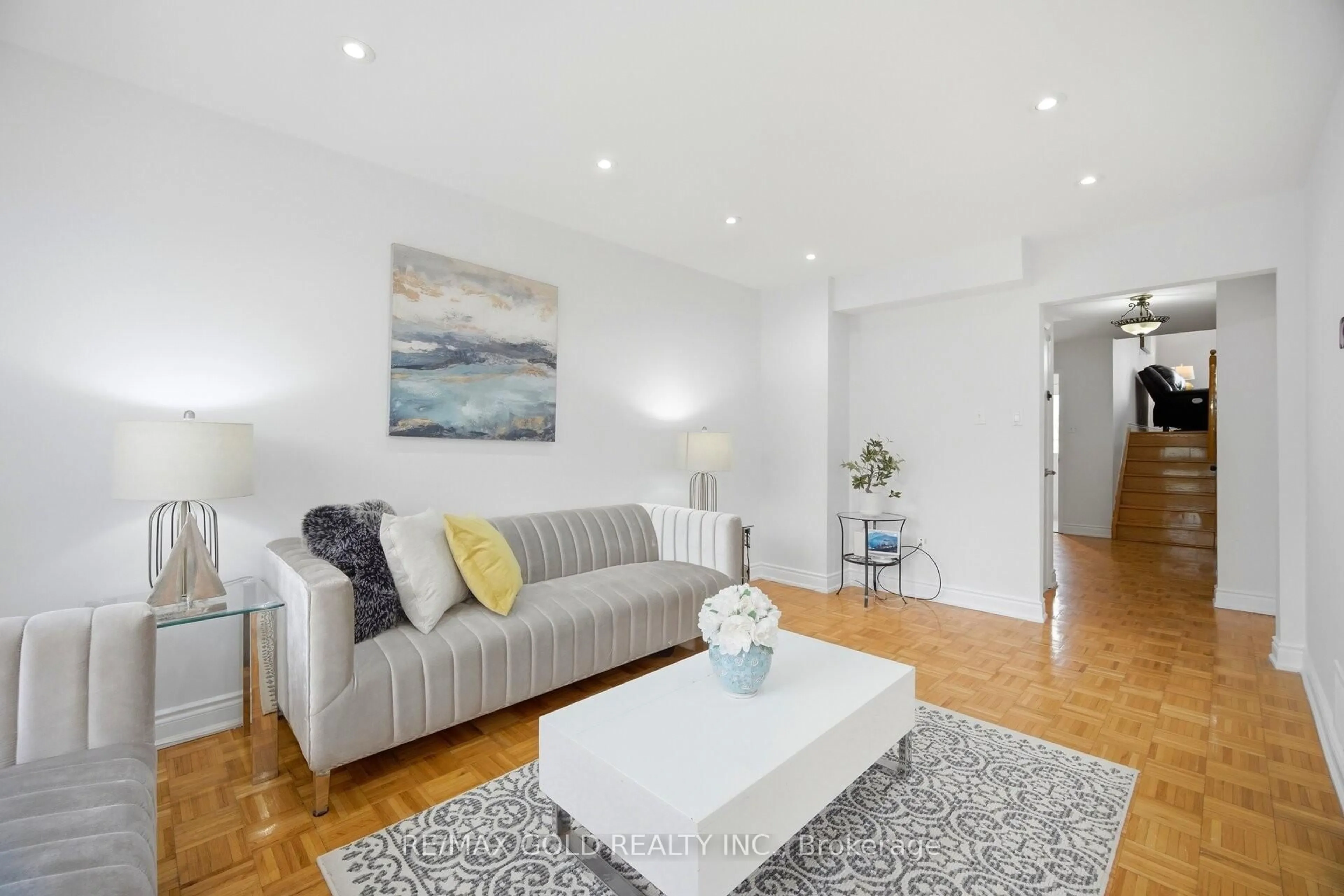 Living room with furniture, wood/laminate floor for 18 Mcgraw Ave, Brampton Ontario L6X 3M4