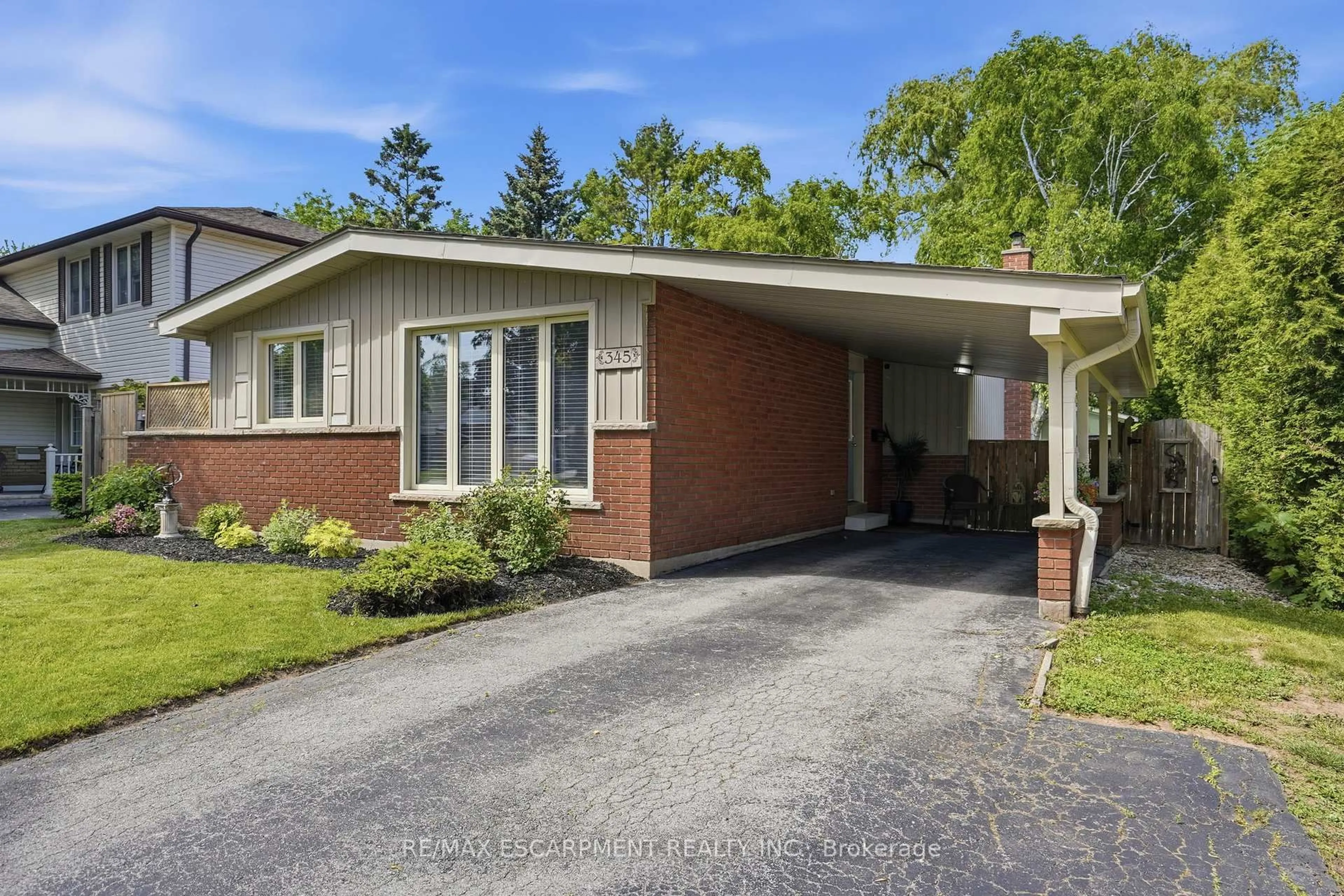 Home with brick exterior material, street for 345 ERINDALE Dr, Burlington Ontario L7L 4T3